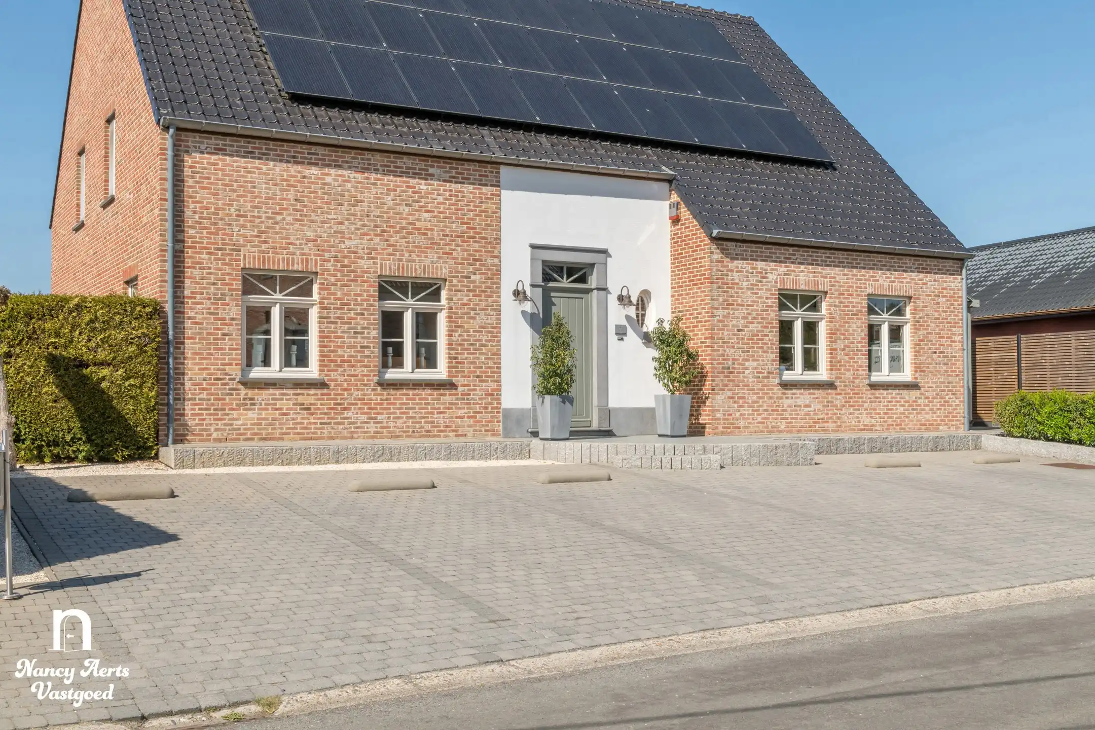 Instapklare woning met goed draaiende kapperszaak aan huis foto 54
