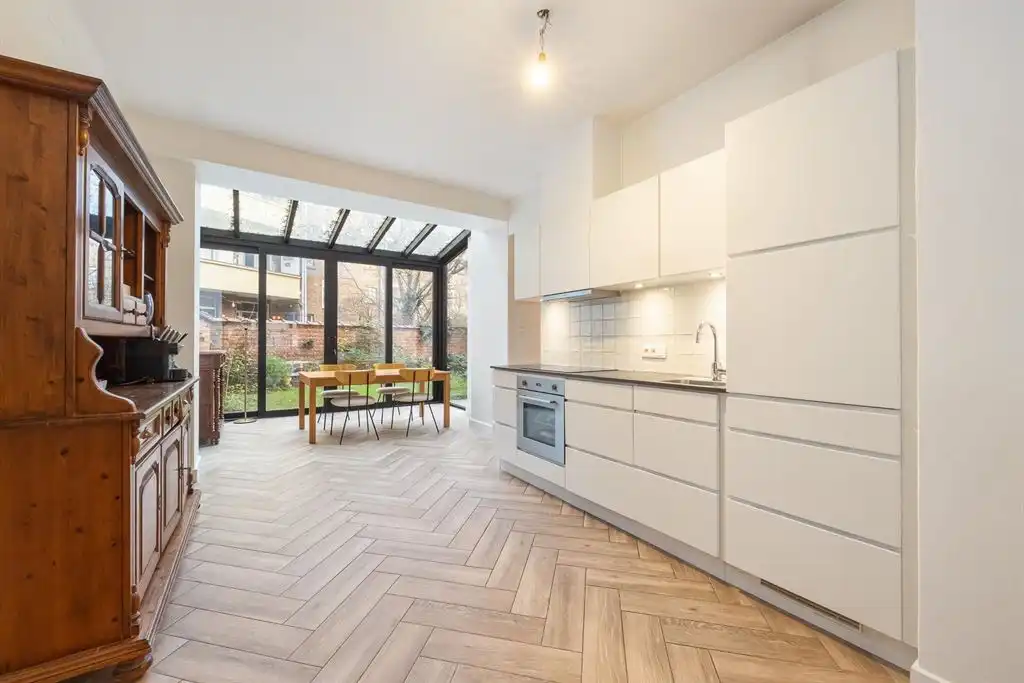 Gelijkvloers appartement met zonnige tuin foto 2