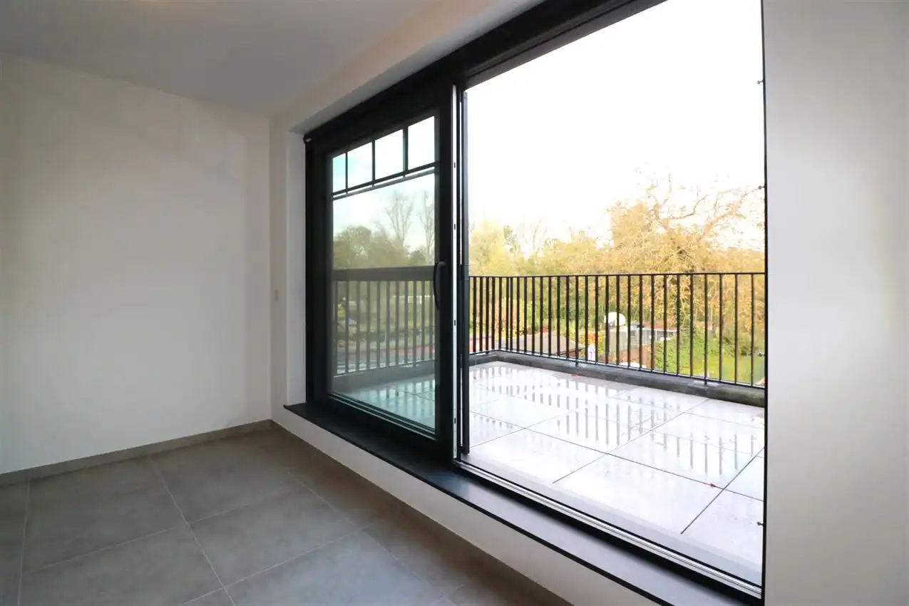 Unieke duplex met twee slpk, terras, autostaanplaats foto 8