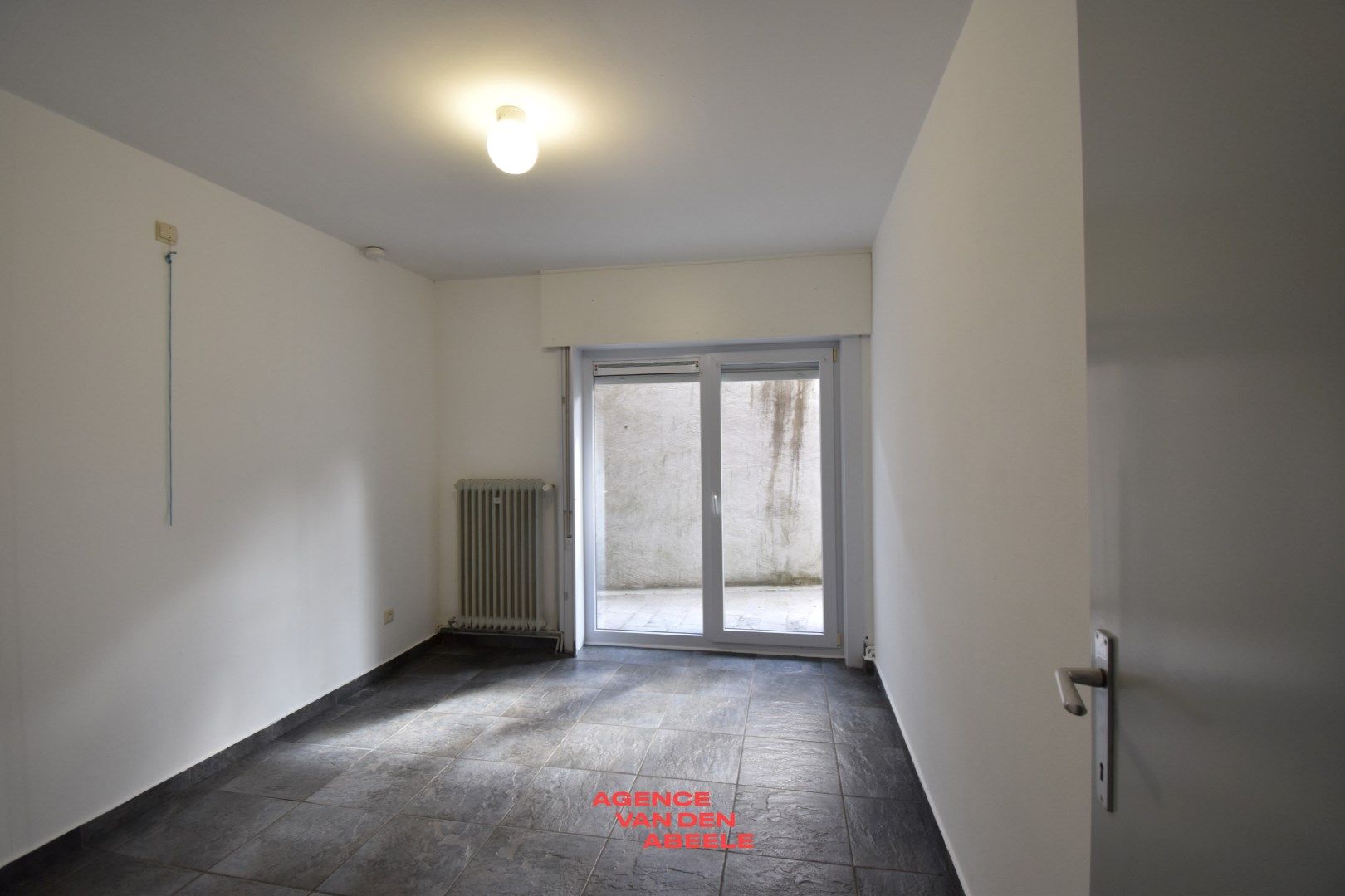 Charmant gelijkvloers appartement met garage foto 8