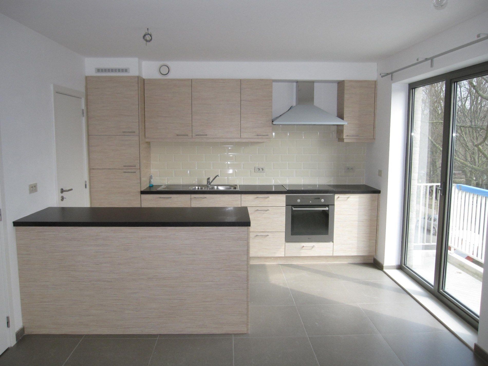 Ruim duplex-appartement met ondergrondse staanplaats en berging foto 2