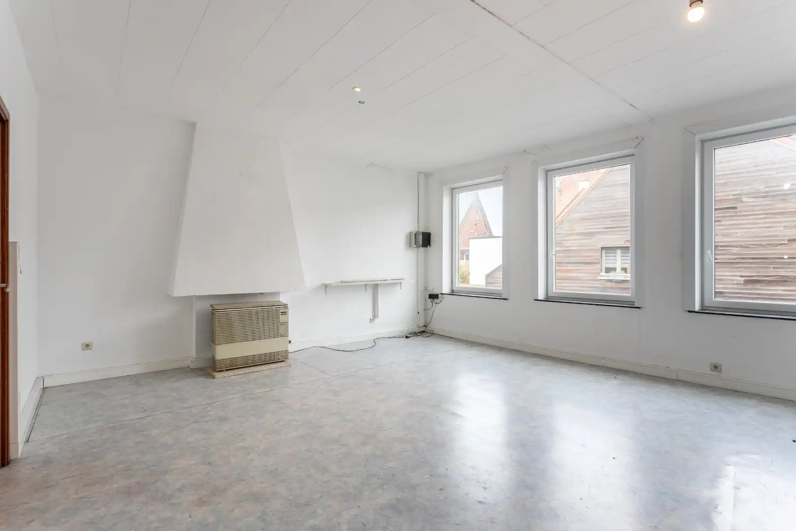 Handelsruimte met woonst op een gunstige ligging foto 16