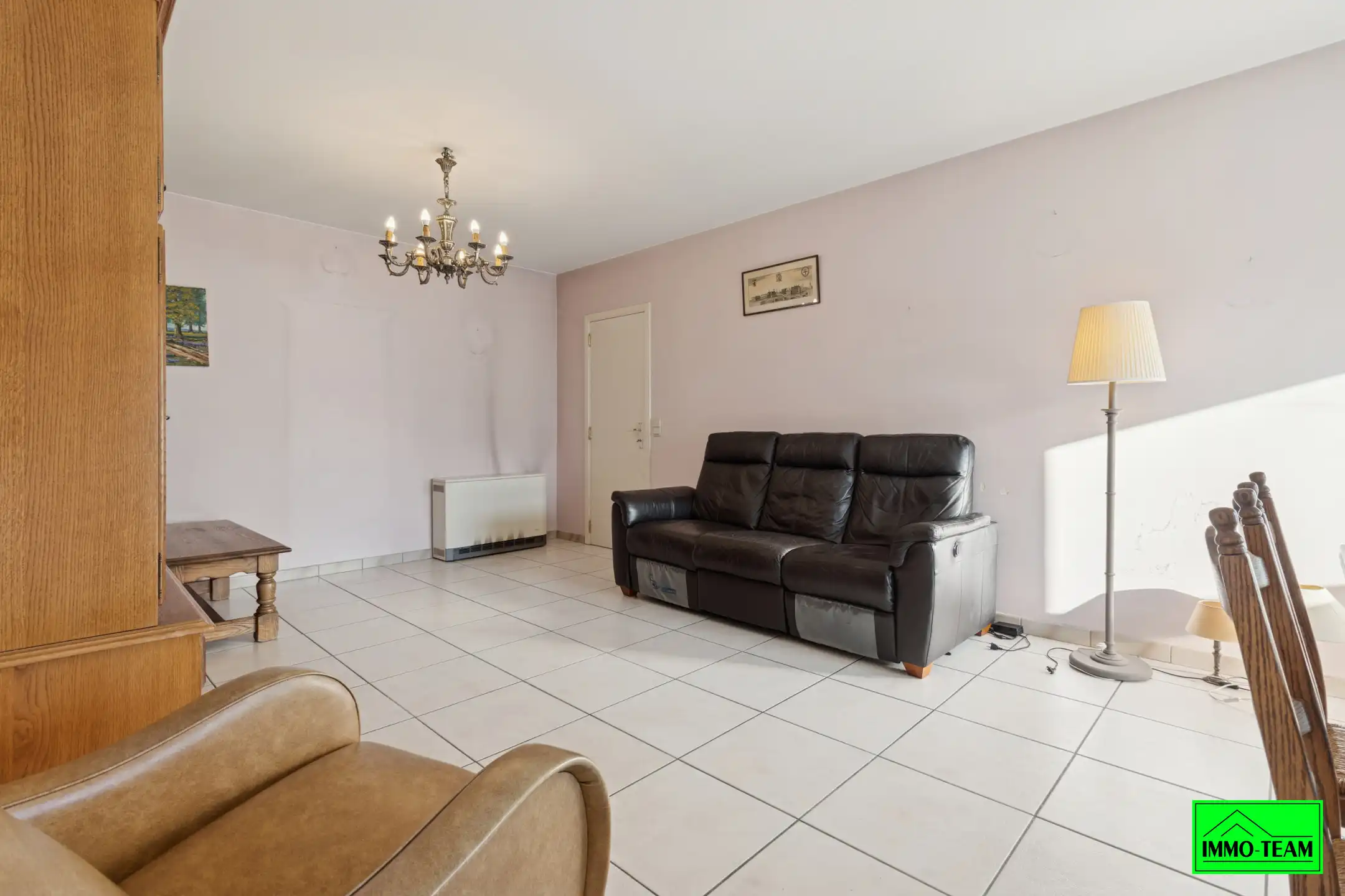 Ruim gelijkvloers appartement met garage foto 3