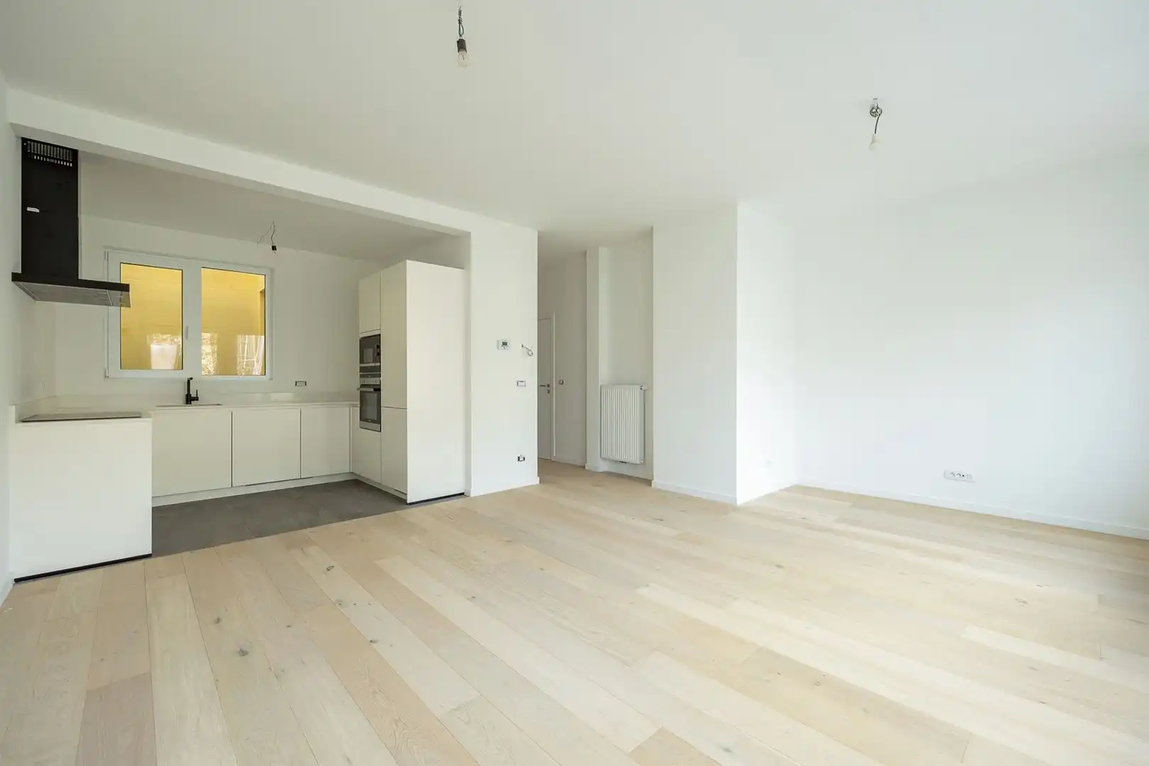 Ruim en licht 2-slaapkamerappartement met dakterras foto 5