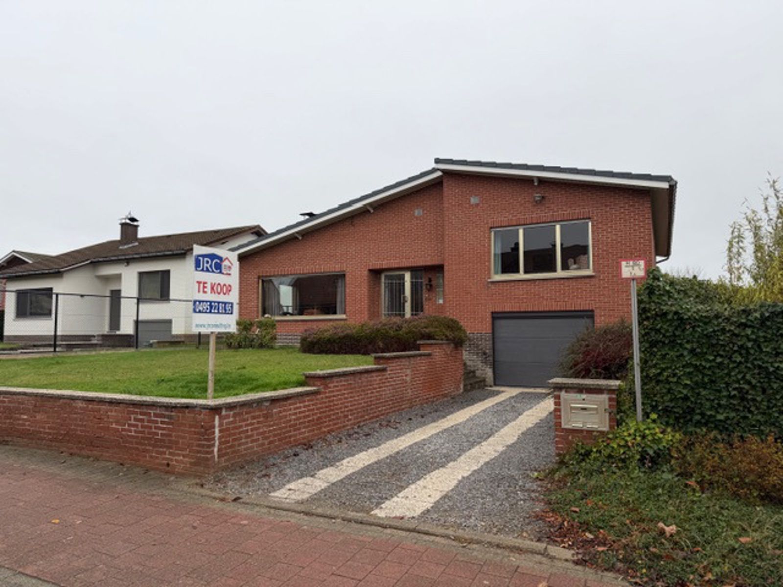 Charmante splitlevelwoning 2 slpks en grote garage te Tienen foto 18
