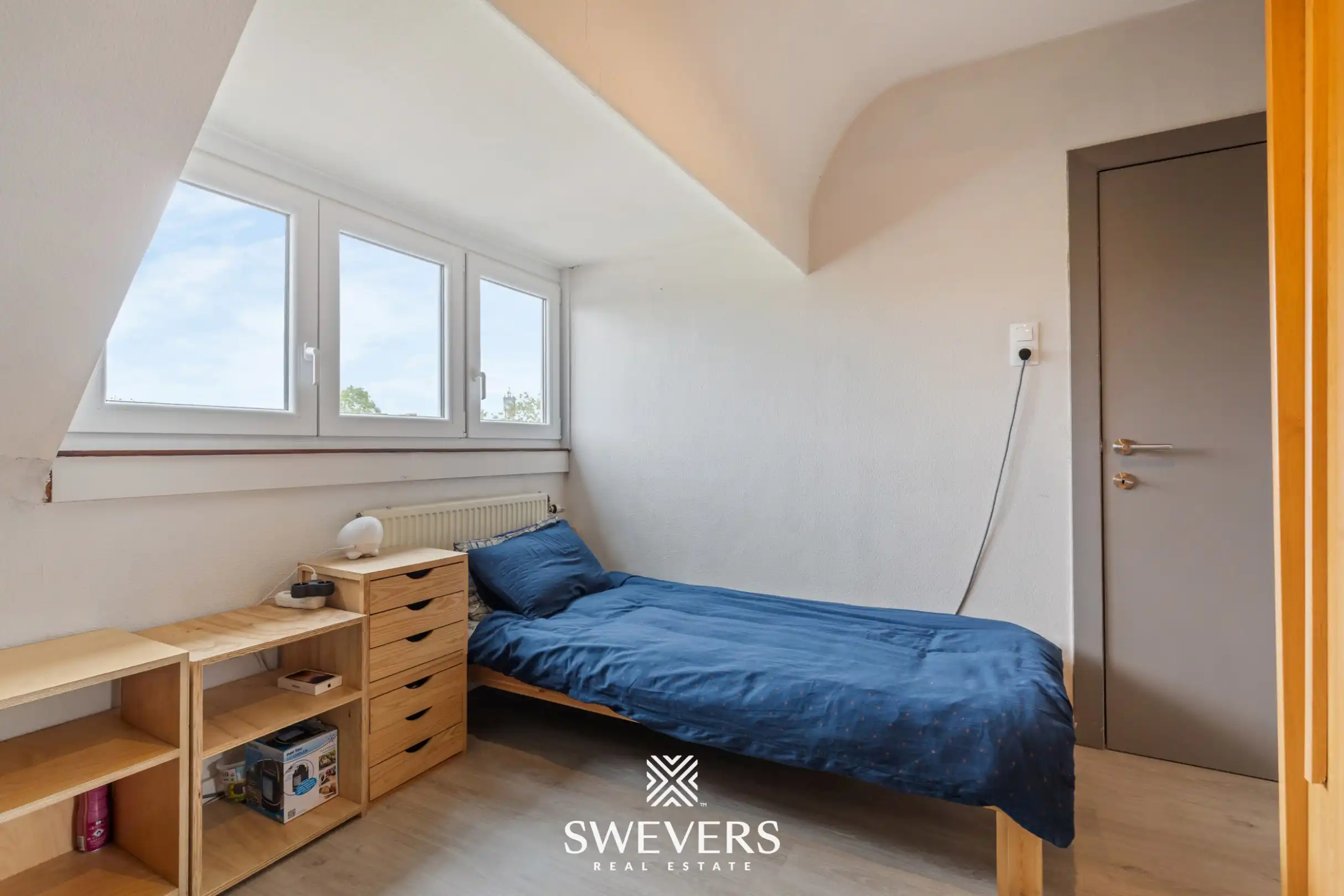 Instapklare rijwoning met 2 zeer ruime slaapkamers en uitstekende ligging foto 14