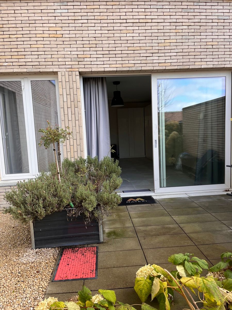 Gelijkvloers appartement te huur + garage foto 14