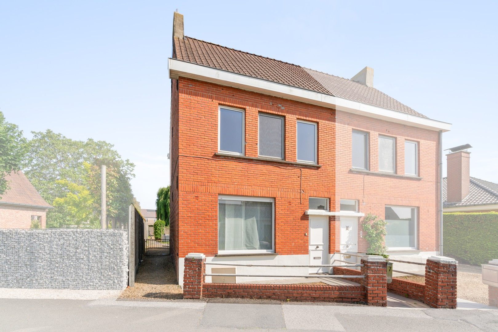 Halfopen woning met tuin in het centrum van Nevele! foto 3