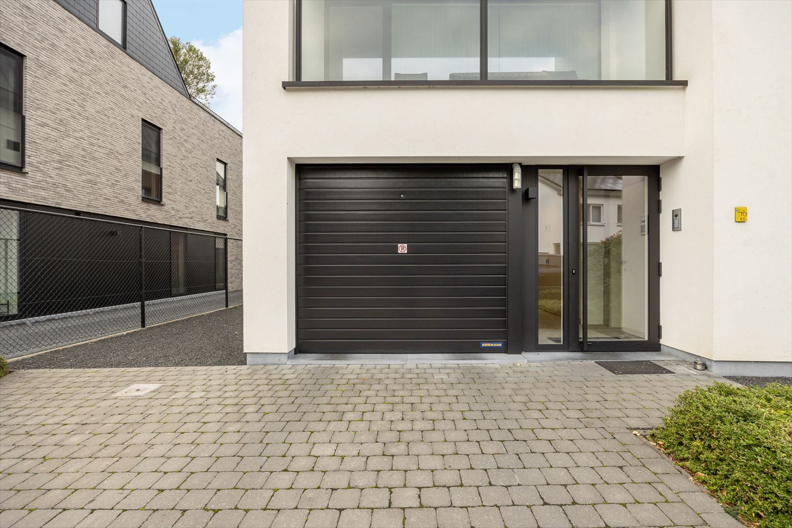 Lichtrijk gelijkvloersappartement met zuid tuin en garage. foto 17