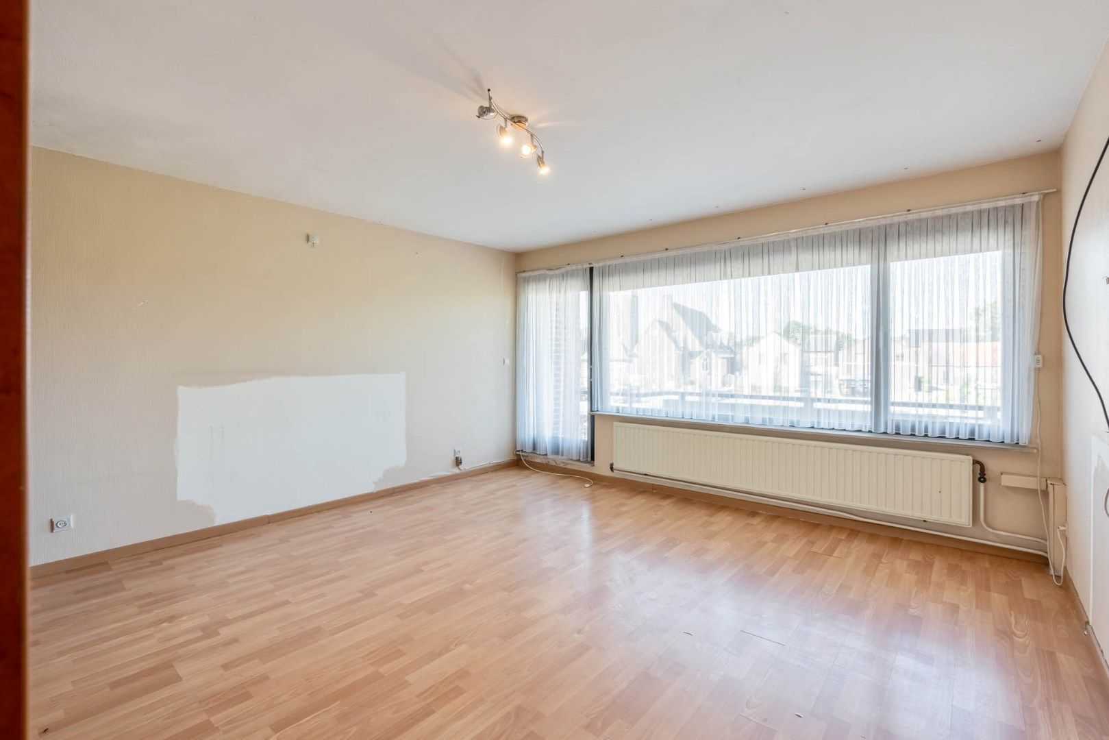 Multifunctioneel gebouw bestaande uit een woning, een winkel en een magazijn/werkplaats gelegen op een rustige locatie te Voorshoven! foto 20