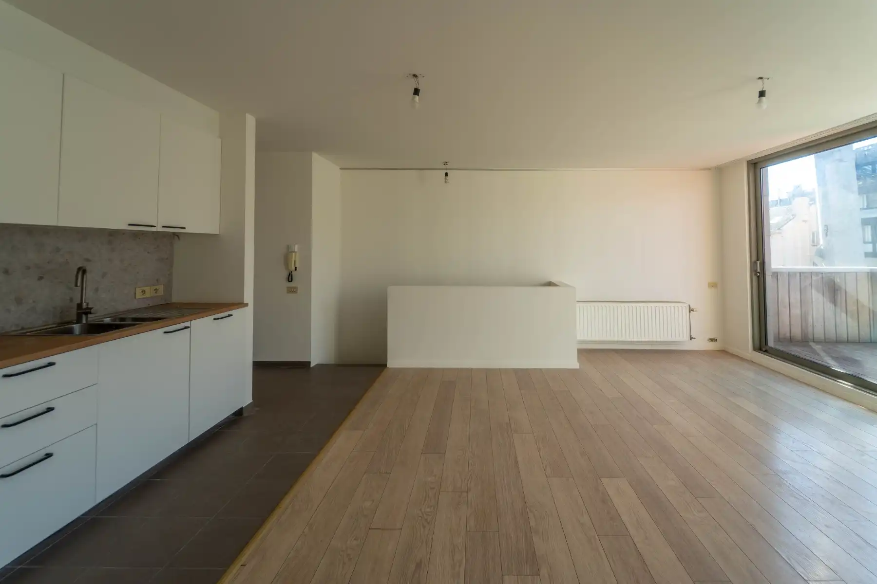 Gerenoveerd appartement met zuidgericht terras op toplocatie vlakbij Gent-Sint-Pietersstation. foto 3