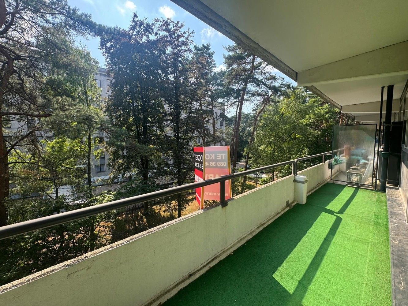 Rustig gelegen en ruim appartement met zonnig terras en garage foto 12
