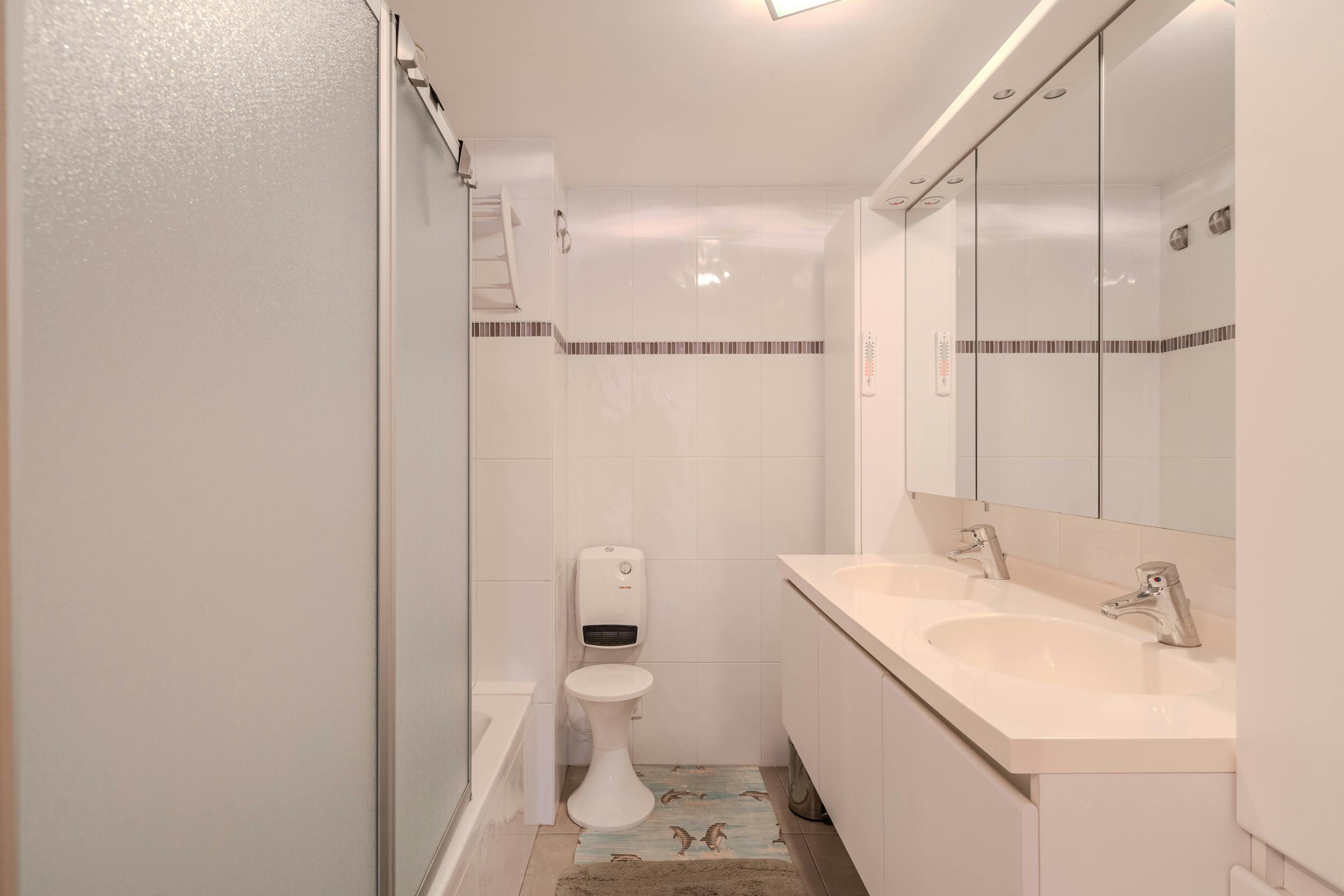 Ruim twee slaapkamer appartement met zongerichte tuin! foto 14