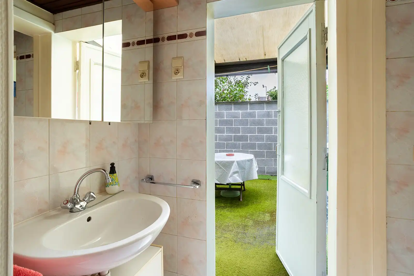 Woning met veel potentieel en zuidwestgerichte stadskoer  foto 11