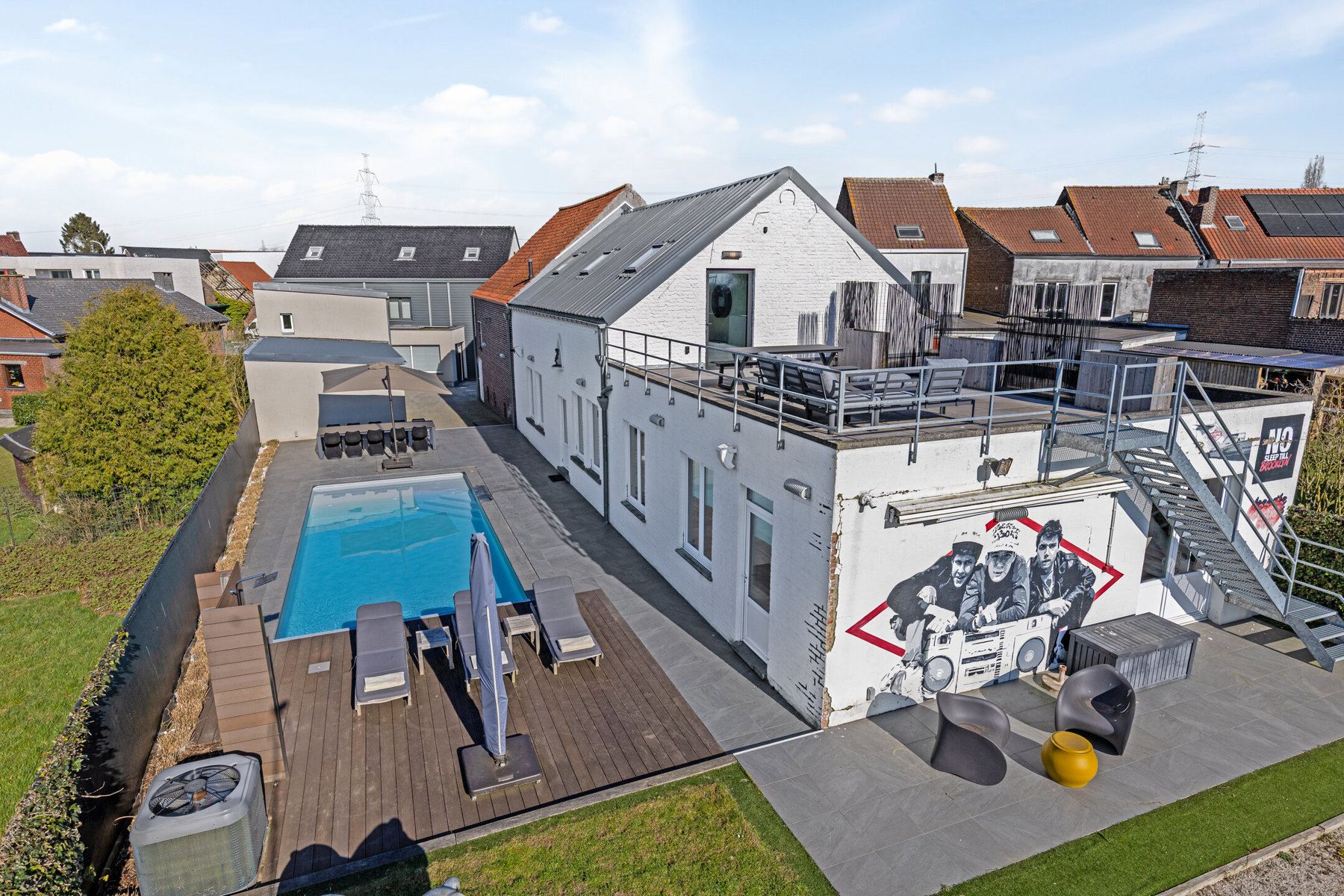 Exclusieve eigendom met loods, showroom en luxe voorzieningen in hartje Asse! foto 2