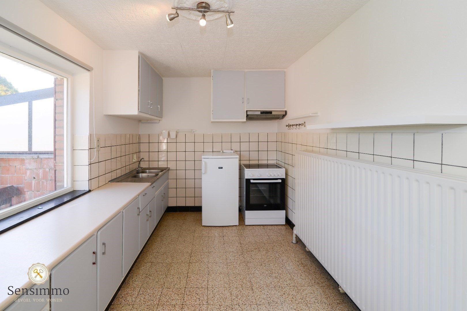 Ruime halfopen 235m² woning op 7a45ca perceel te Genk foto 4