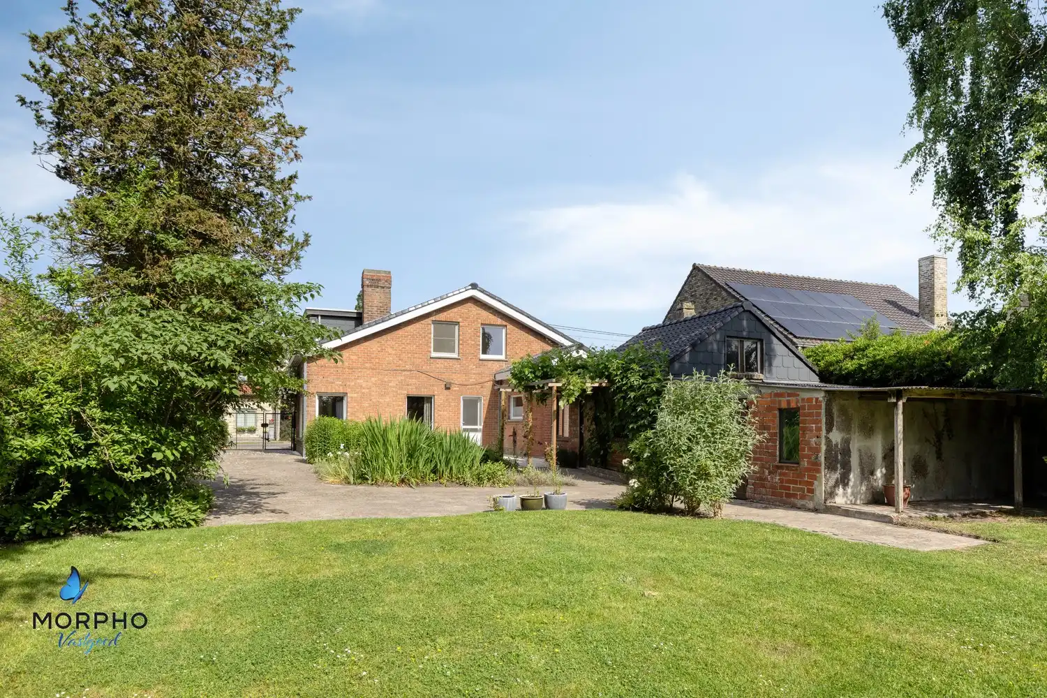 Ruime gezinswoning met 4 slaapkamers, garage en riante, pittoreske tuin foto 32