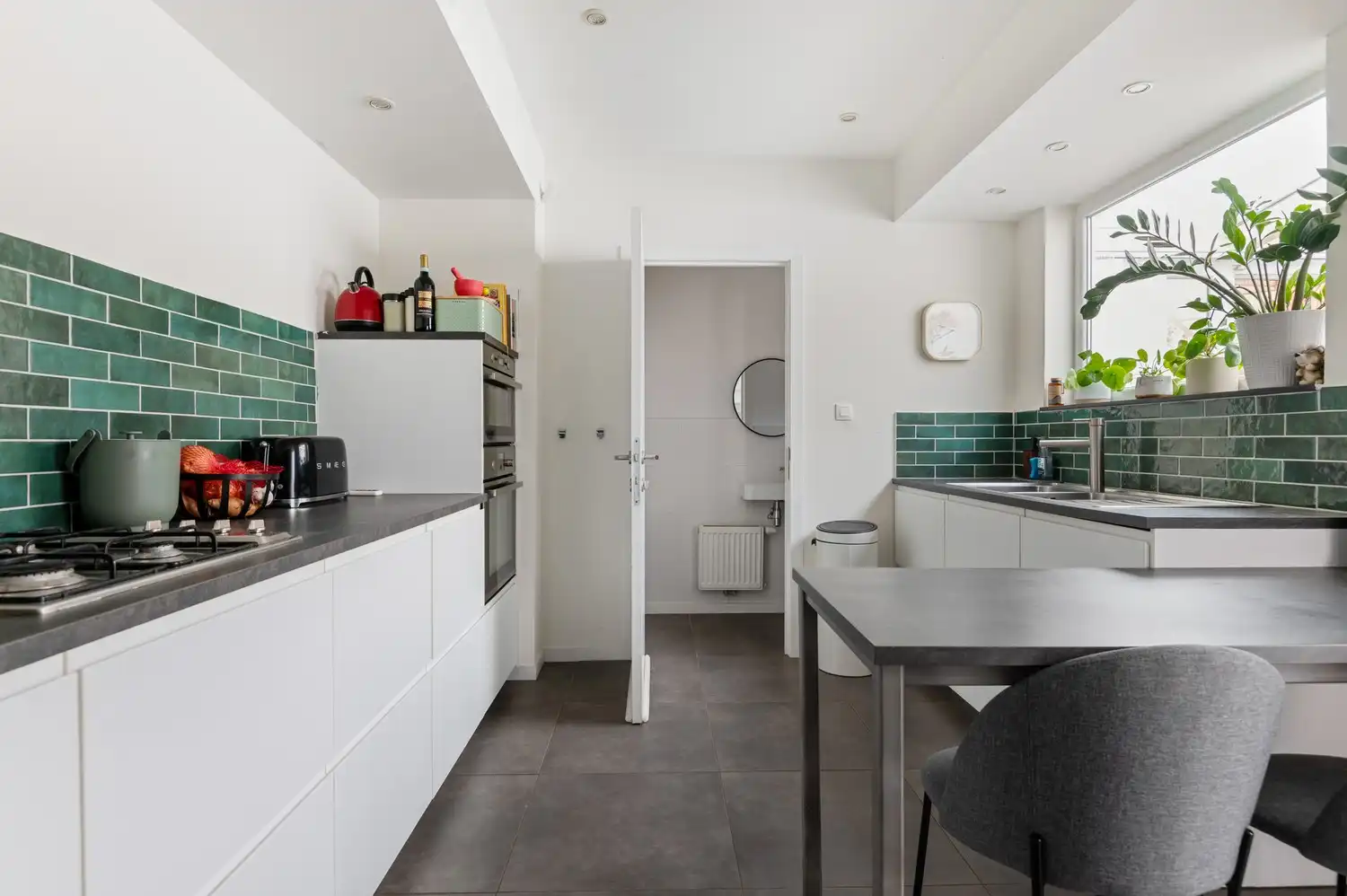 Instapklare gezinswoning met 2-3 slaapkamers, veranda en tuin in hartje Wijnegem! foto 6