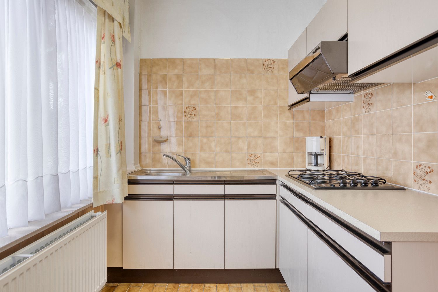 Te renoveren gelijkvloers appartement met 2 slaapkamers en tuin! foto 13