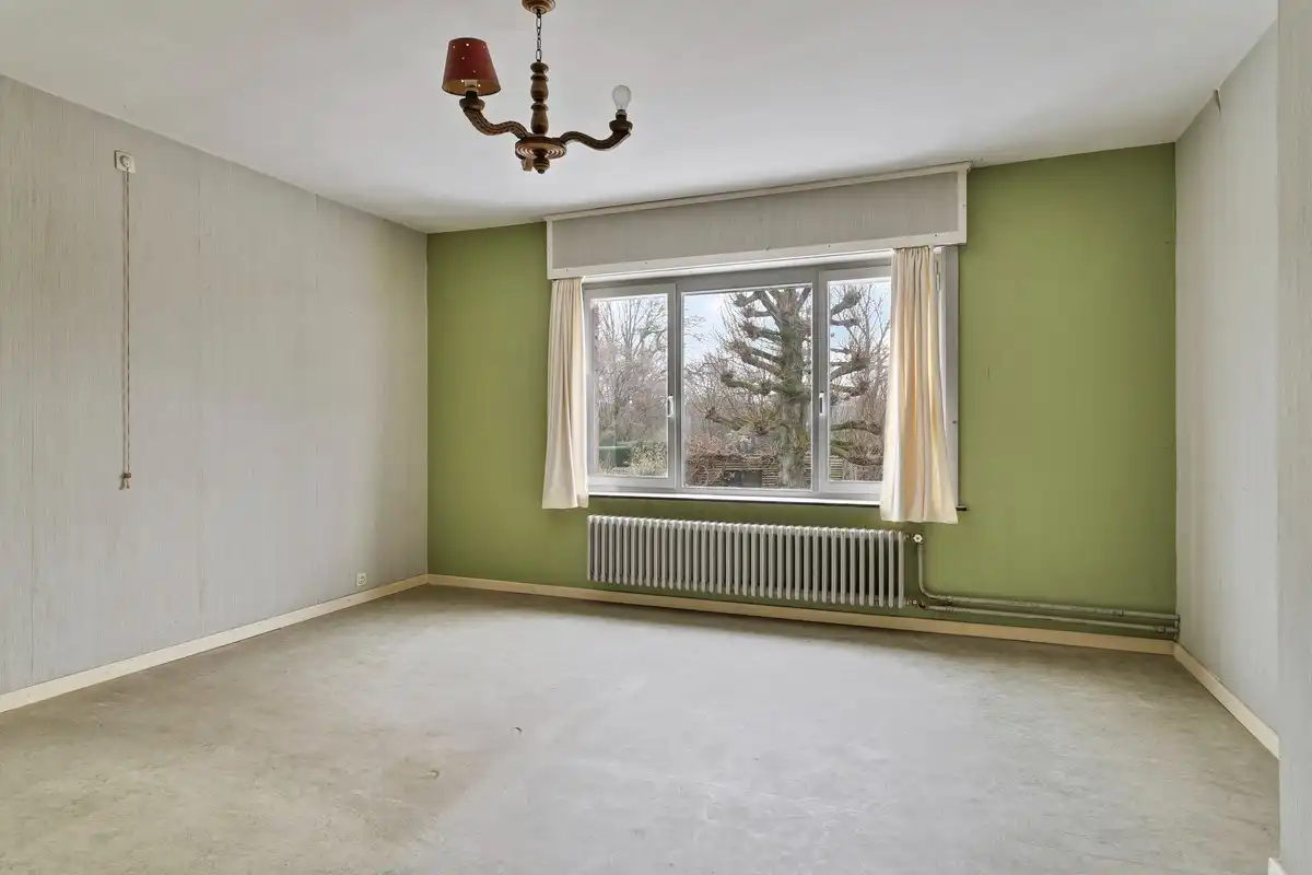 Ruime woning met 4 slaapkamers en garage! foto 13