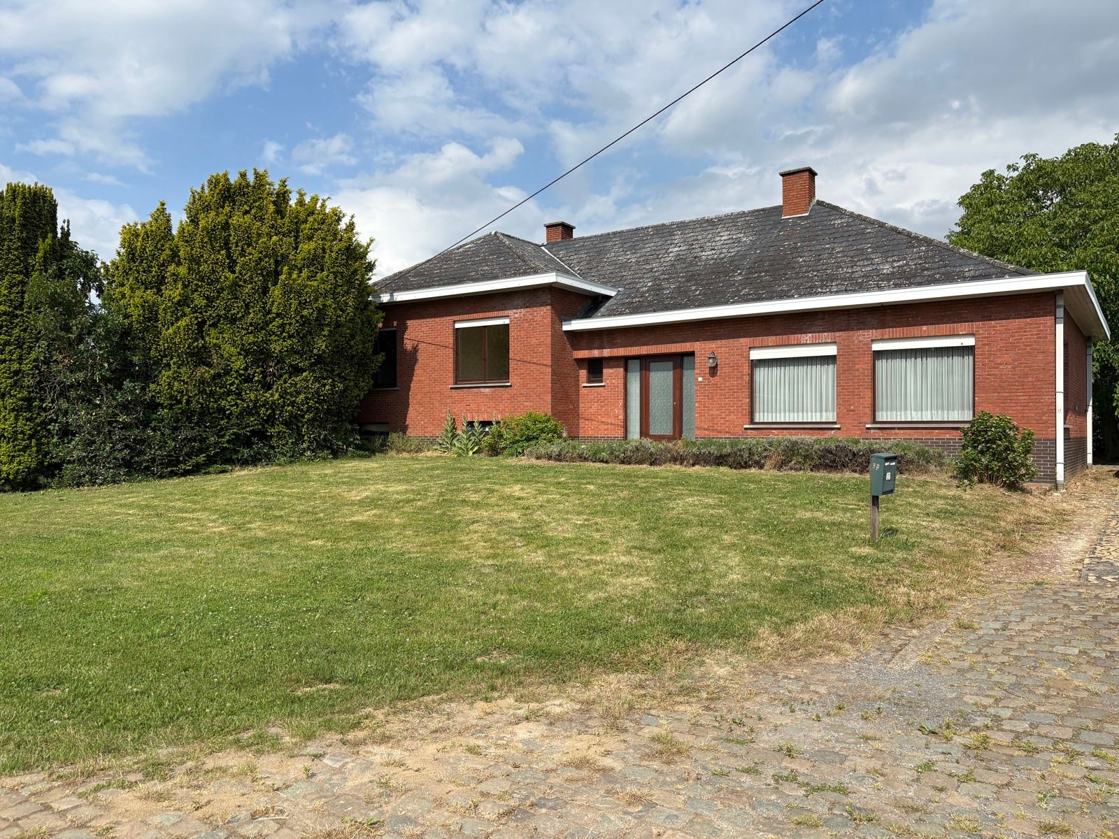 Te renoveren gelijkvloerse woning in groene omgeving foto 2