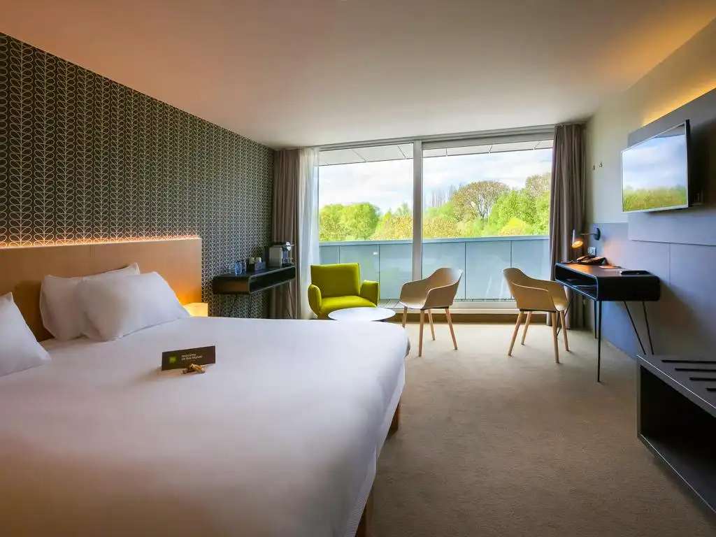 Hotelkamer als investering in ibis Kortrijk Expo foto {{pictureIndex}}