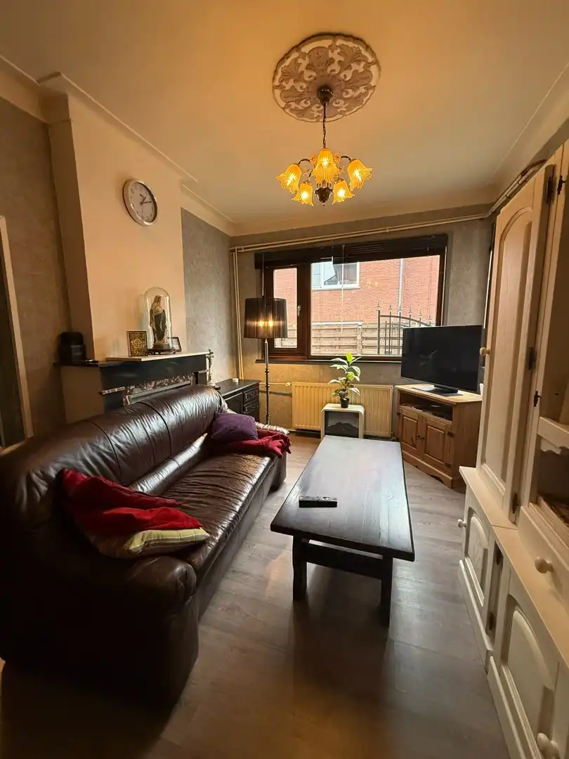 Opbrengsteigendom bestaande uit 2 halfopen woningen met garage en tuin te Hechtel. foto 9