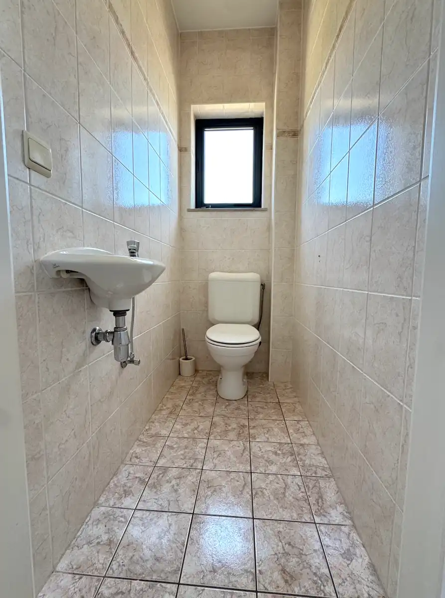 Instapklaar appartement met 2 slaapkamers én garage! foto 18