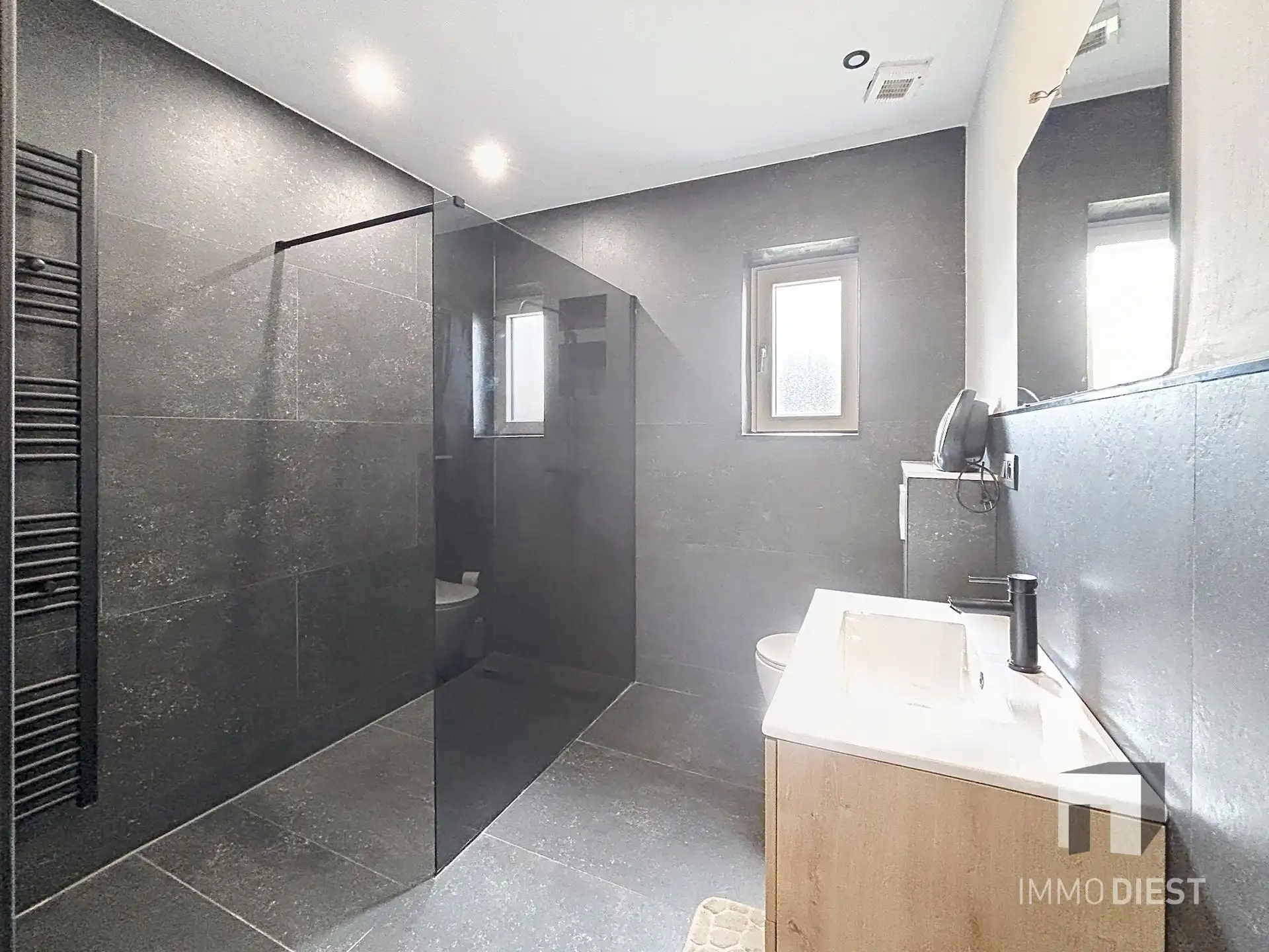 Gerenoveerde gelijkvloers woning centrum Tessenderlo foto 25