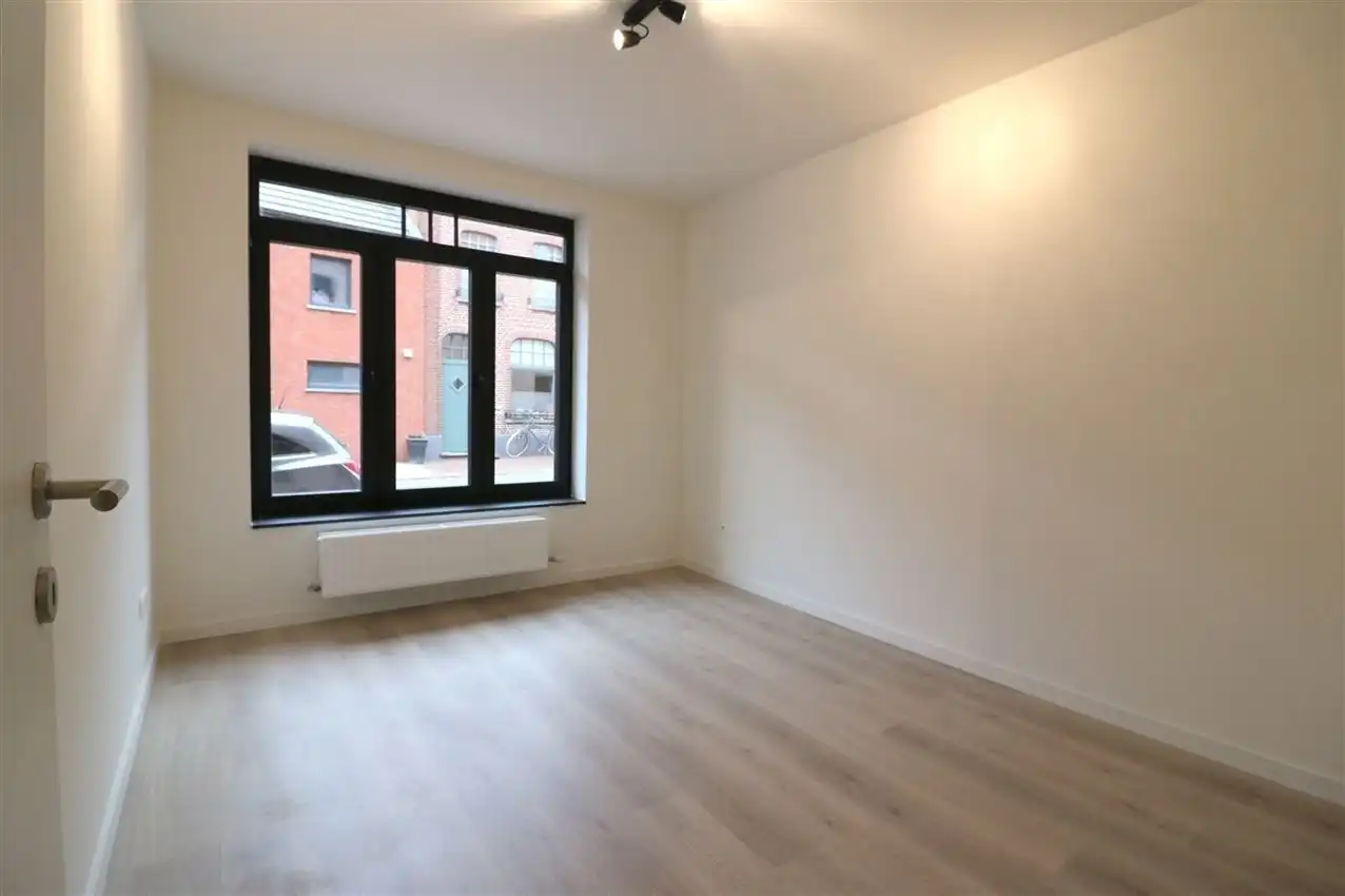 Gelijkvloers appartement met 2 slpk., terras en autostaanplaats foto 8