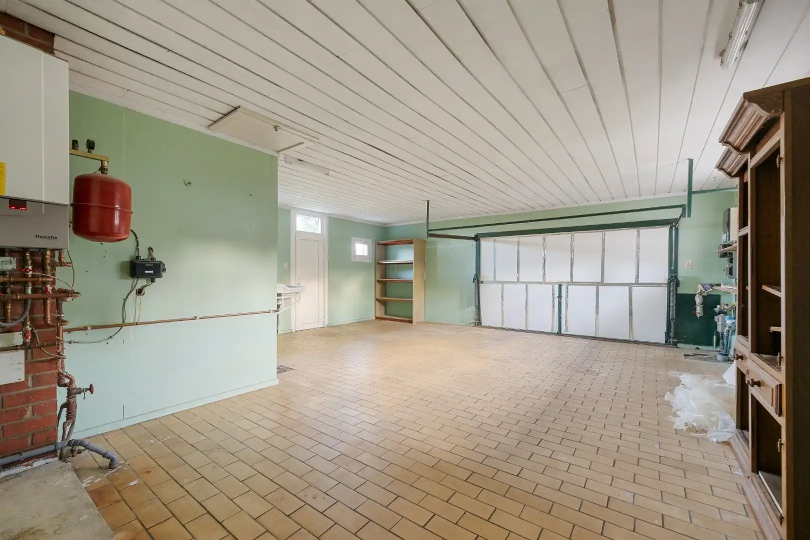 Gelijkvloerse woning met 3 slaapkamers, ruime garage en tuin. foto 15