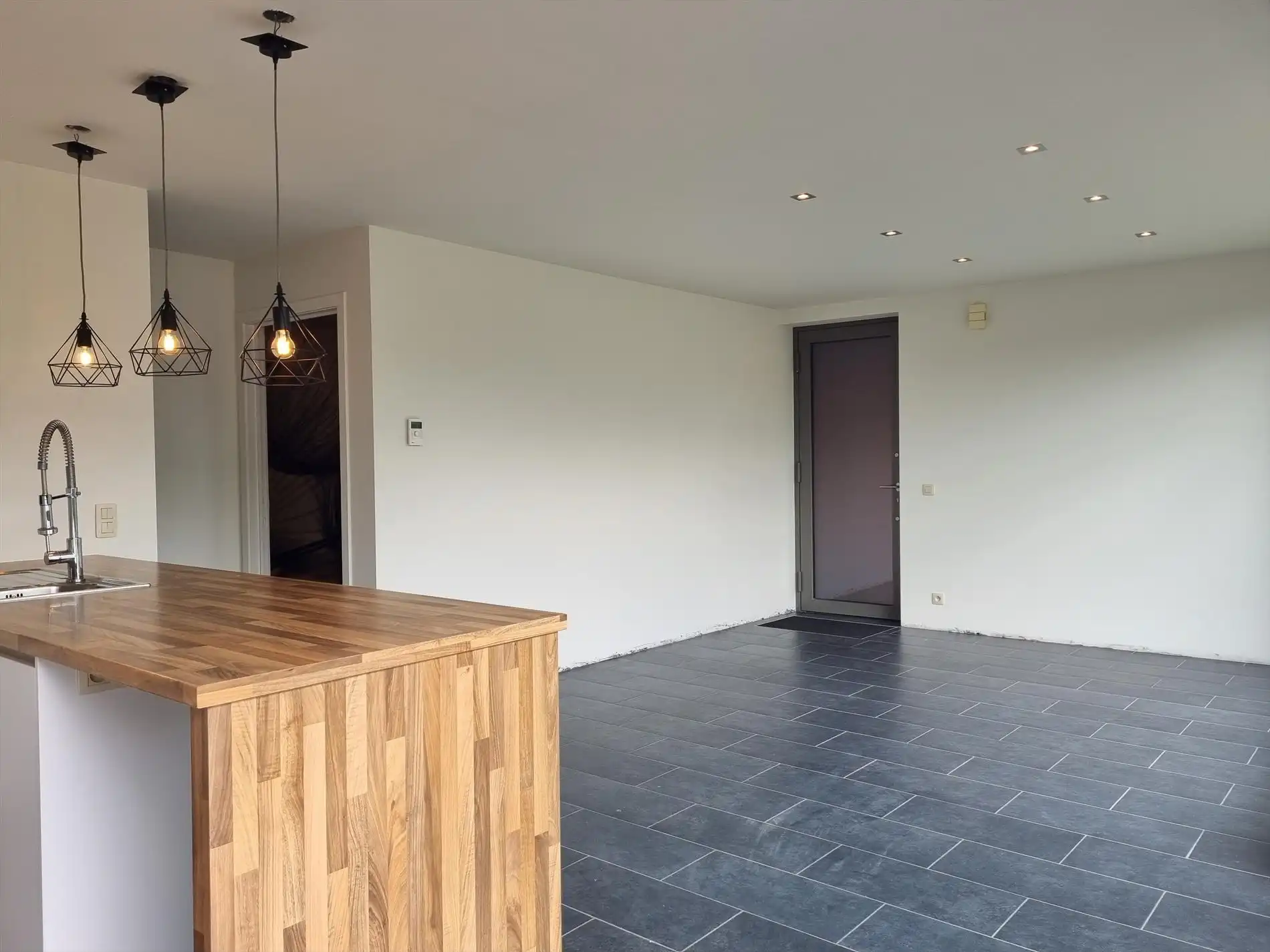 Knap gelijkvloers éénslaapkamerappartement met tuin en garagebox. foto 8