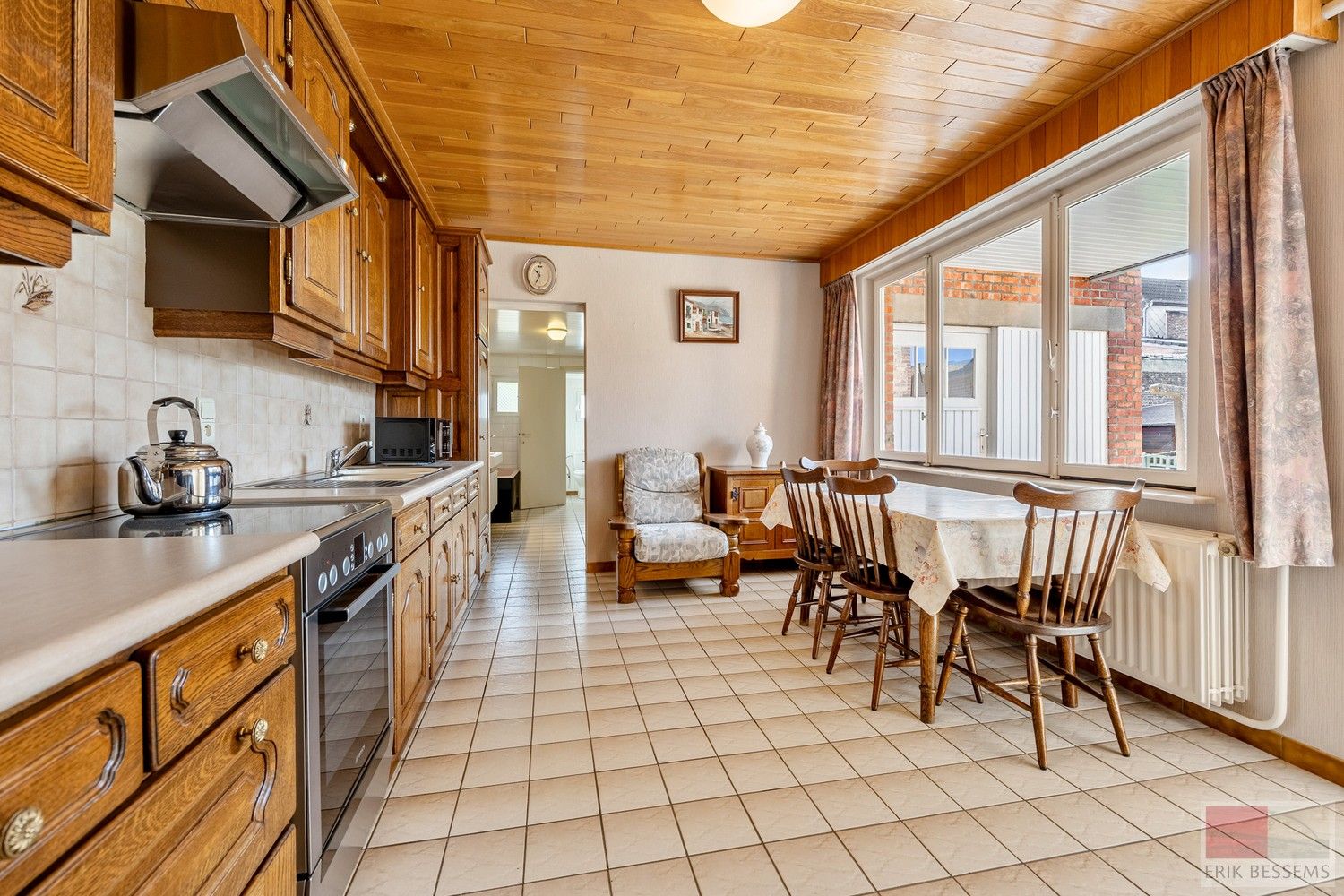 Leuke te renoveren halfopen bebouwing met potentieel en 3 ruime slaapkamers. foto 11