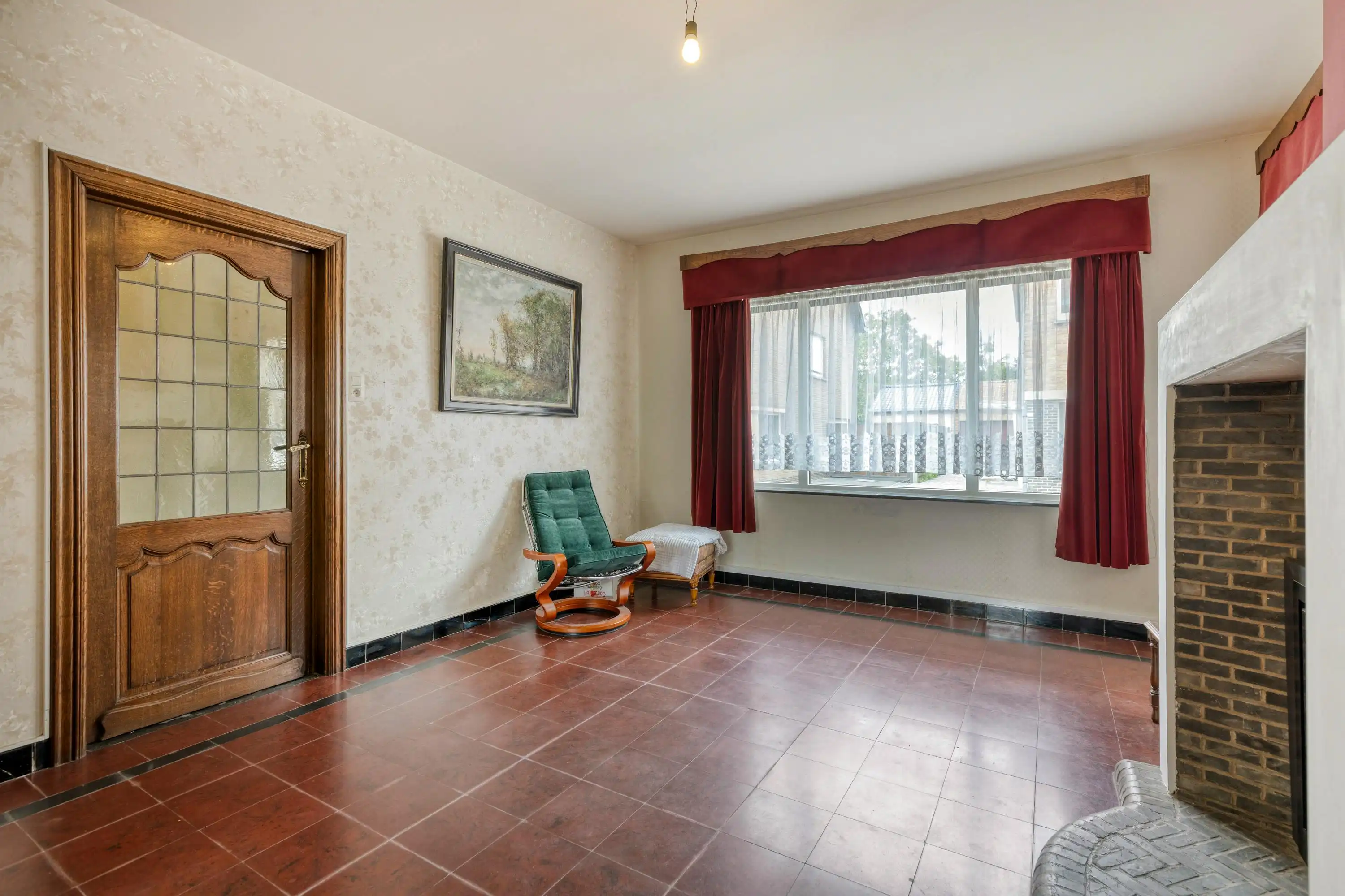 Halfopen huis met 3 slaapkamers, carport + tuin te Sint-Kruis foto 4