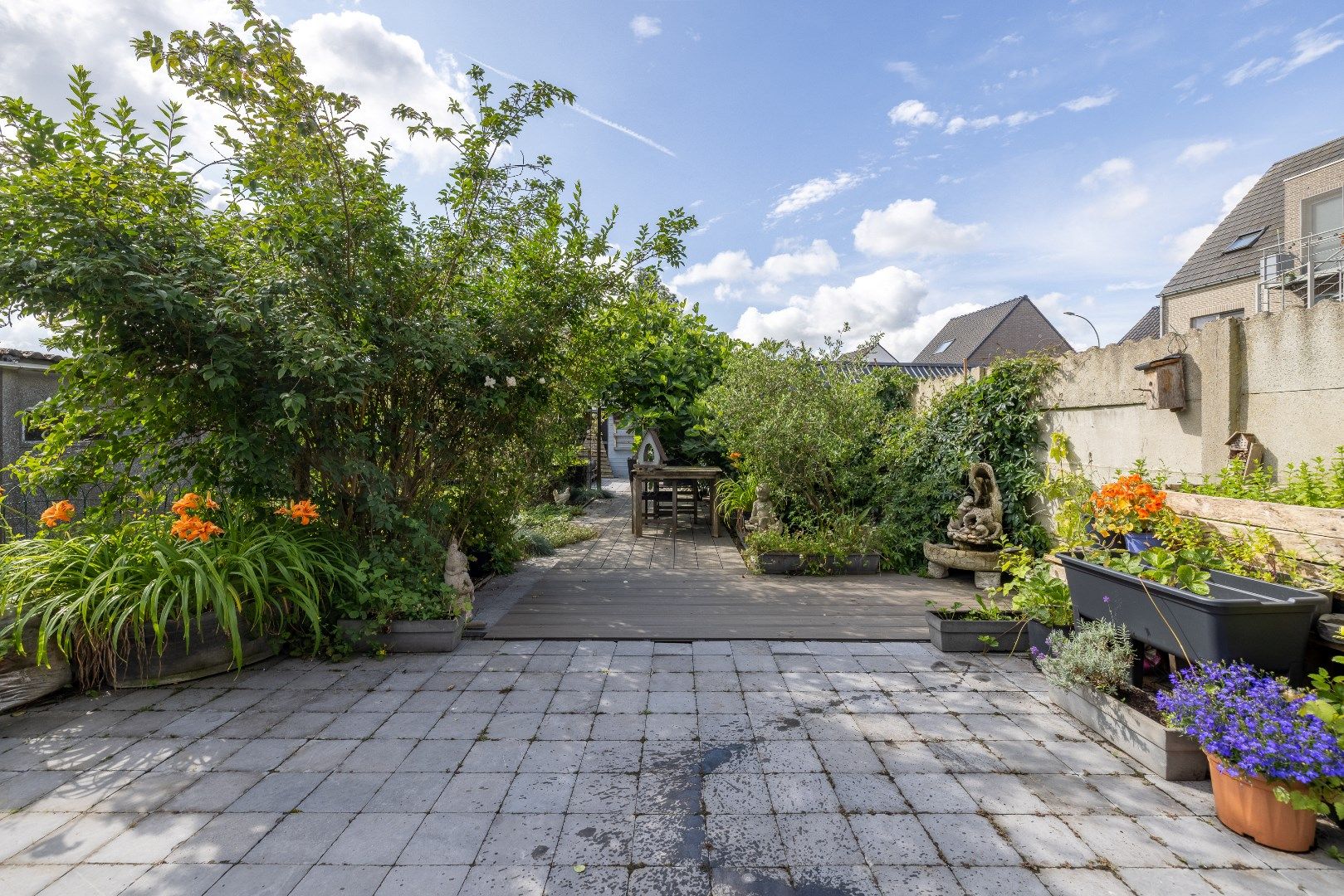 Uiterst gezellige woning met 3 slk, garage, terras en tuin foto 10