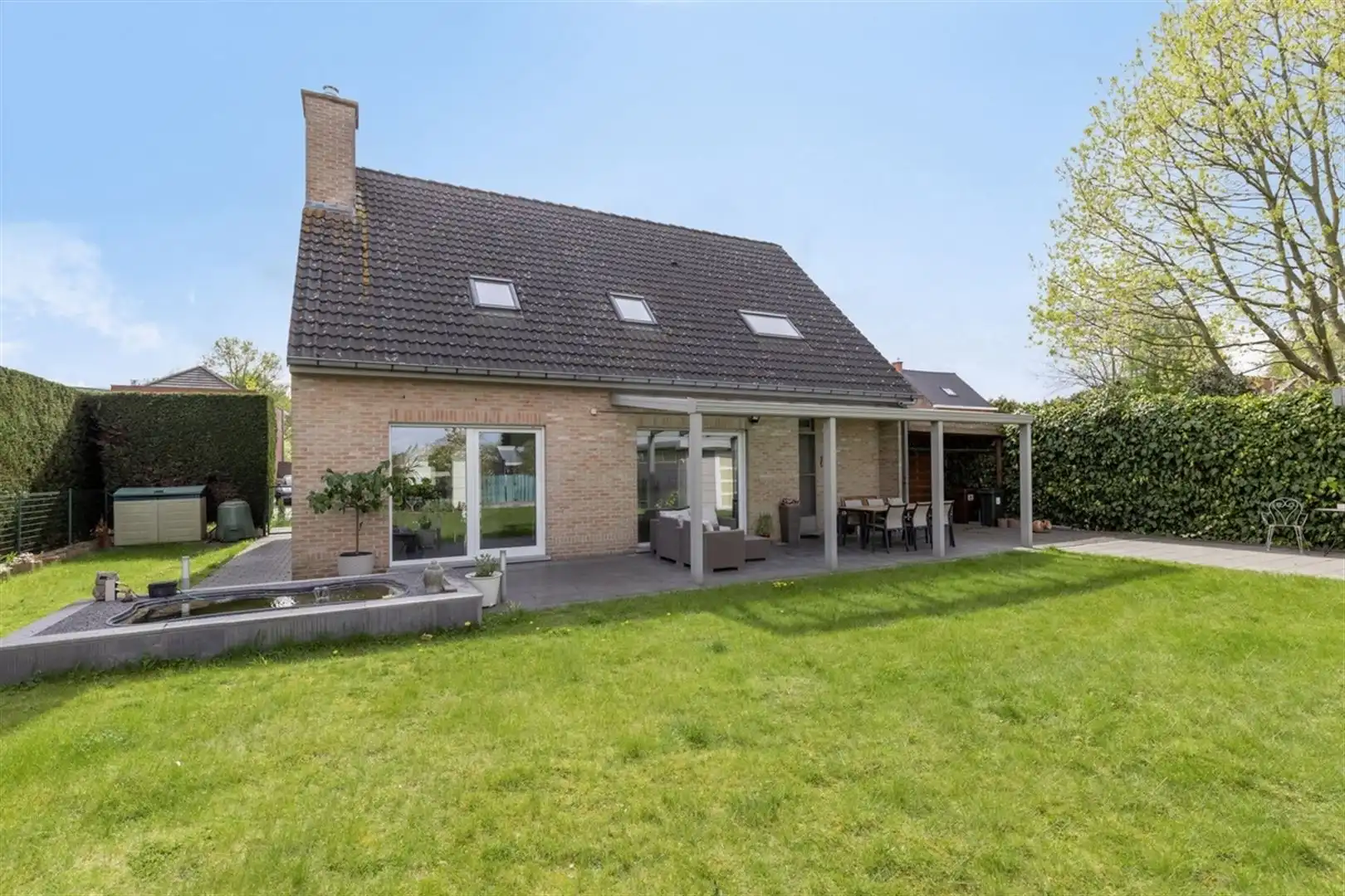 Verzorgde woning met 3 slpk en garage foto 31