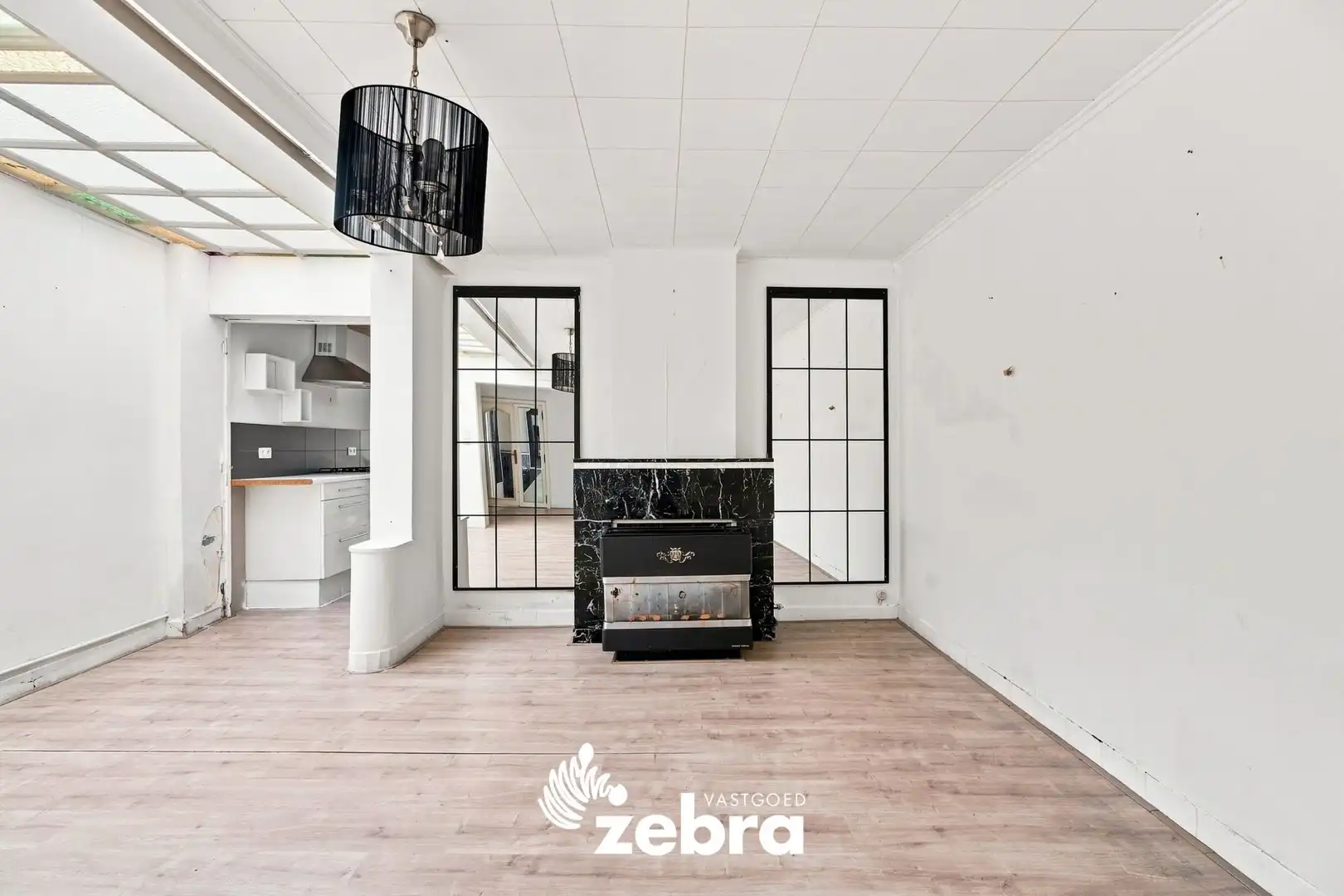 Op te frissen woning met 4 slaapkamers en ruime tuin met uitweg te Tielt! foto 7