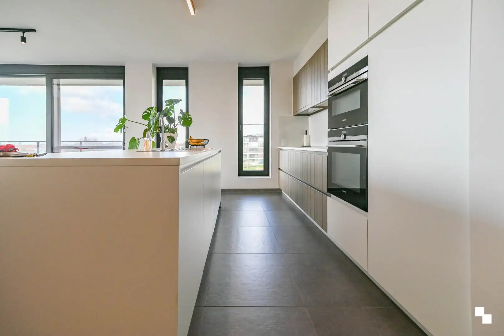 Uniek bijna energieneutraal hoekappartement met ruim terras foto 5