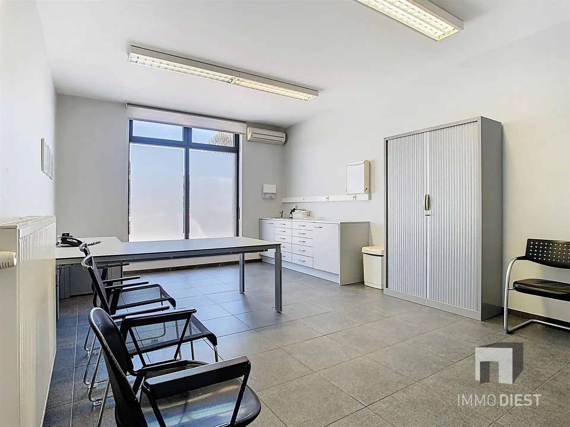 Opgedeeld handelspand in het centrum van Tessenderlo foto 16