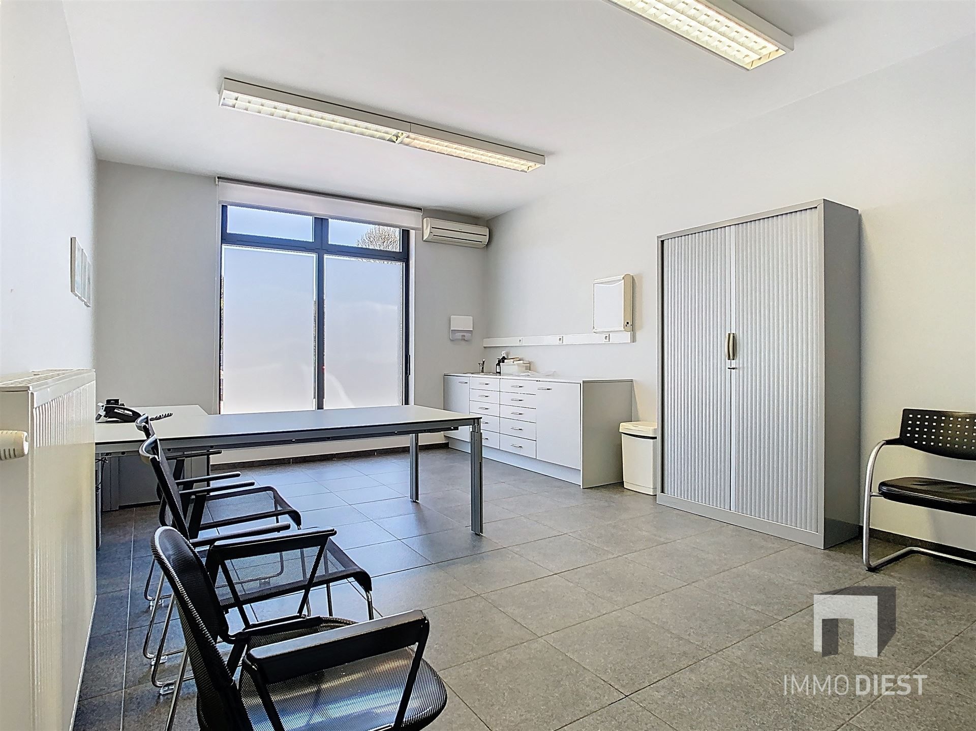 Opgedeeld handelspand in het centrum van Tessenderlo foto 16