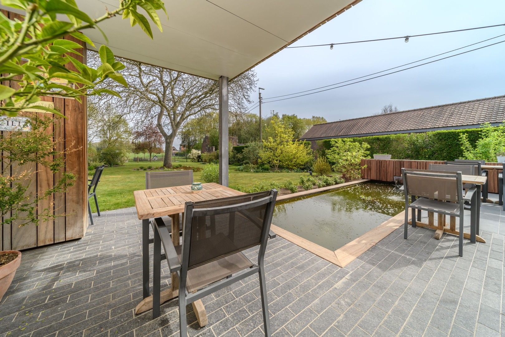 Charmant woonhuis  + achterliggend stuk bouwgrond op landelijke toplocatie foto 10