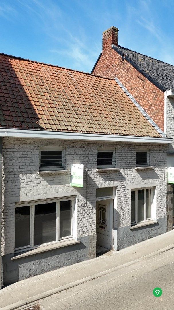 Te renoveren woning op ruim perceel in het centrum van Koekelare – veel potentieel!  foto 5