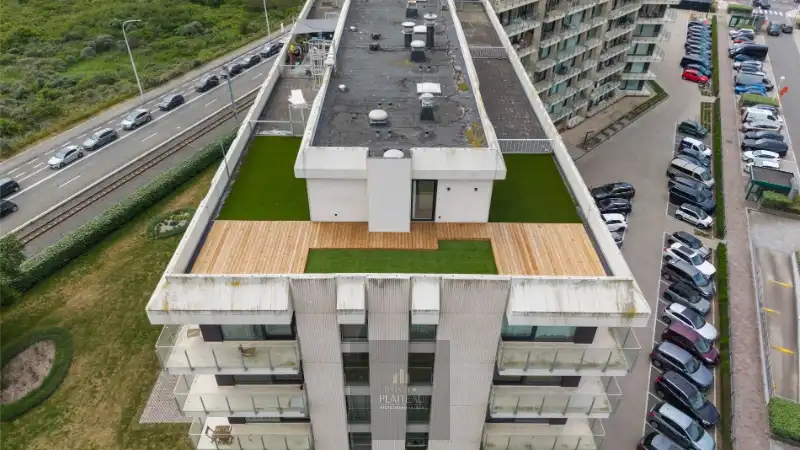 Vernieuwd dakappartement met zeer groot dakterras. foto 34