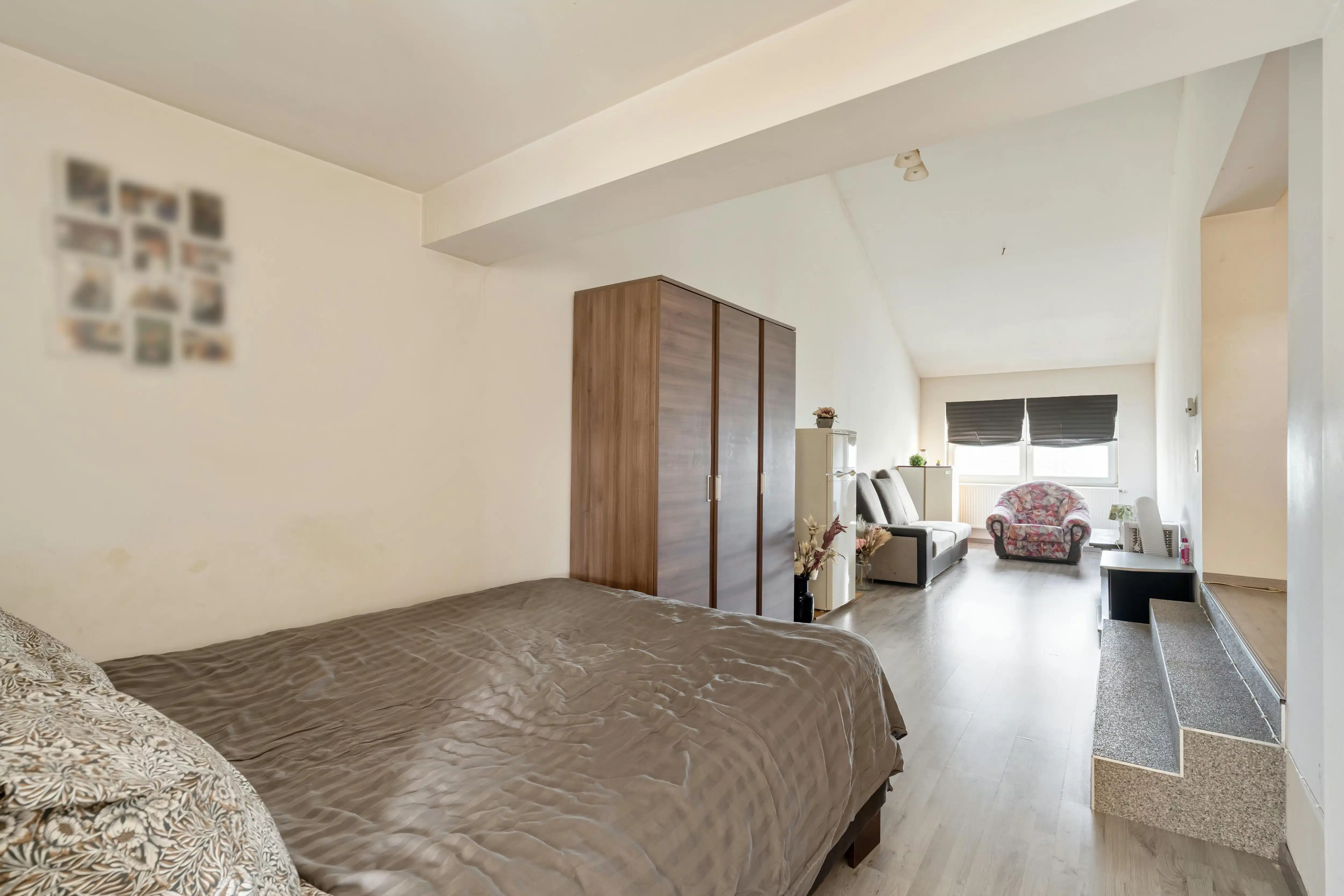 Rendabele opbrengsteigendom met handelspand, magazijn, woonst en 2 appartementen in Genk foto 13