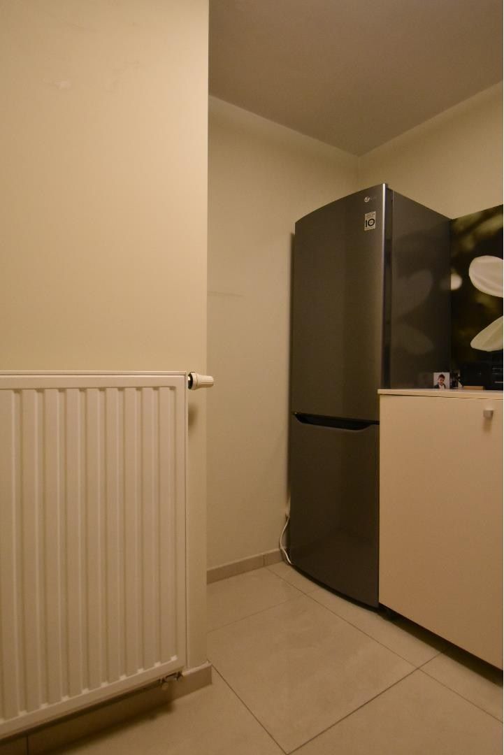 Zeer nette en ruime stadswoning/duplex-appartement met inpandige garage in hartje Bilzen foto 20