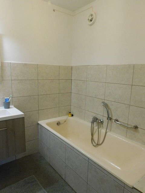 Knus gelijkvloers appartement met tuin  foto 9