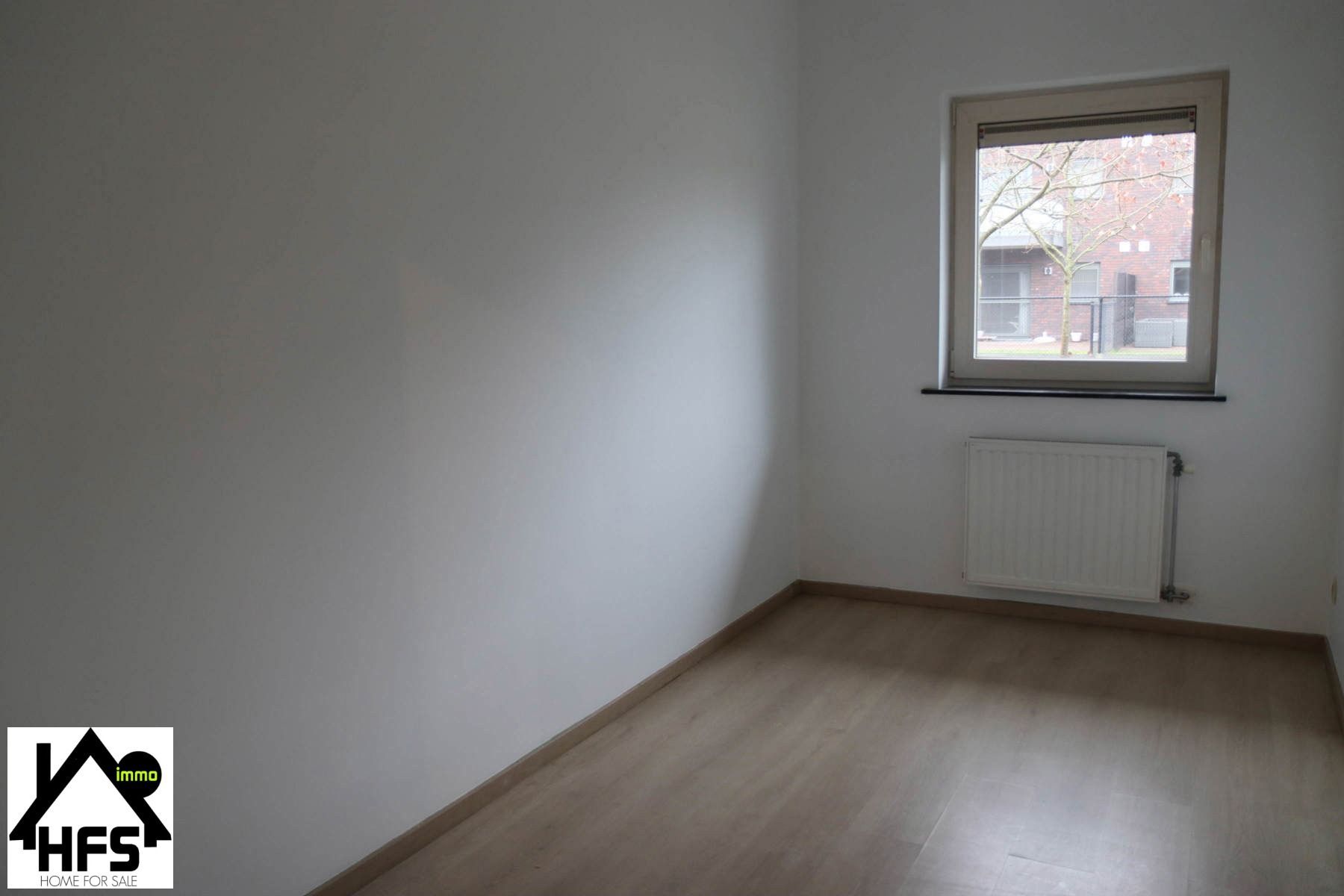 Rustig gelegen gelijkvloers appartement met zonnig ruim terras met staanplaats foto 7