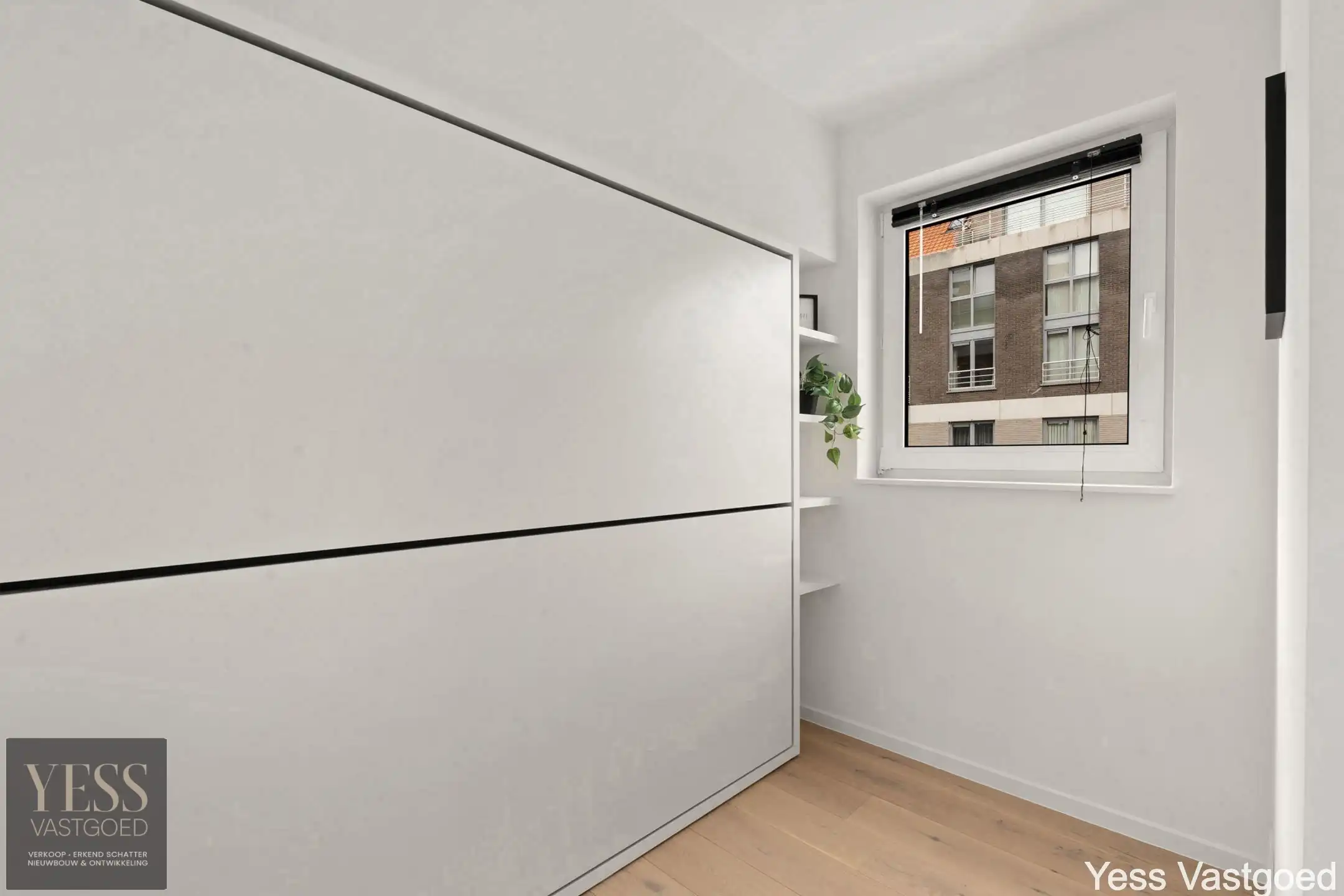 Prachtig gerenoveerd app met 2 slaapkamer centraal gelegen. foto 11