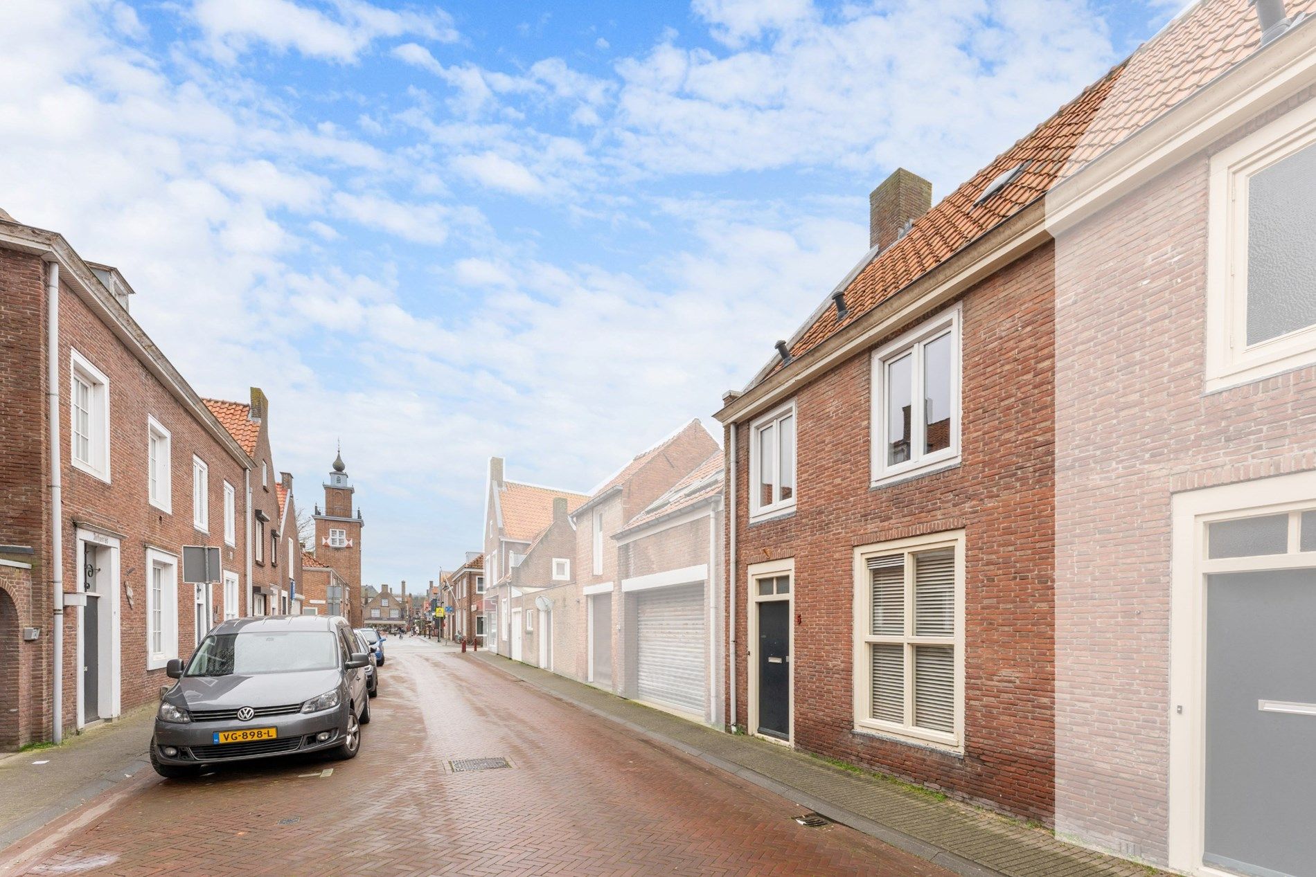 Rijwoning met toffe tuin en uitweg te Sluis (Nederland) foto 1