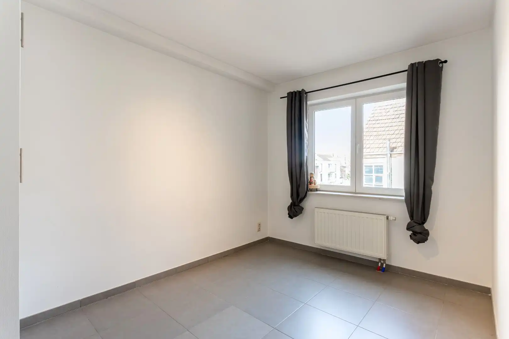 Handelspand met woonst te Halle centrum foto 24